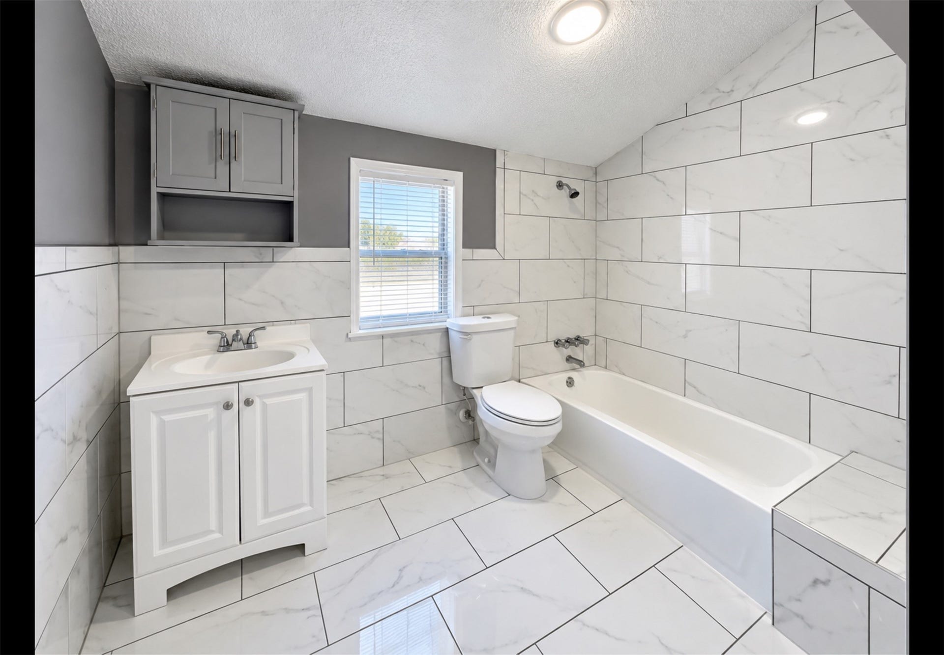 Primary Restroom - can sit on the side of the batch for comfort.