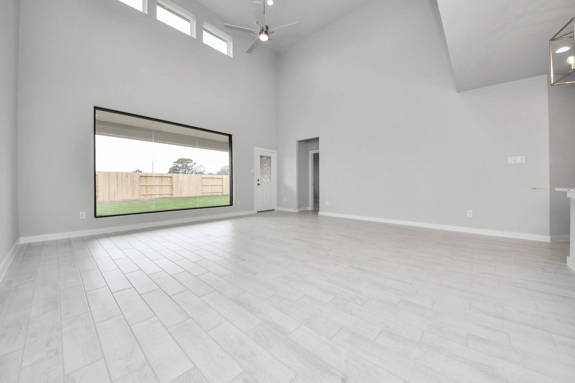 11115 Tulip Ridge Trail, Houston, TX 77044 Take another glimpse into the heart of the home with this additional view of the family rooma sprawling space ready to accommodate all your gatherings. Sample photo of completed home with similar floor plan. Actual colors and selections may vary.