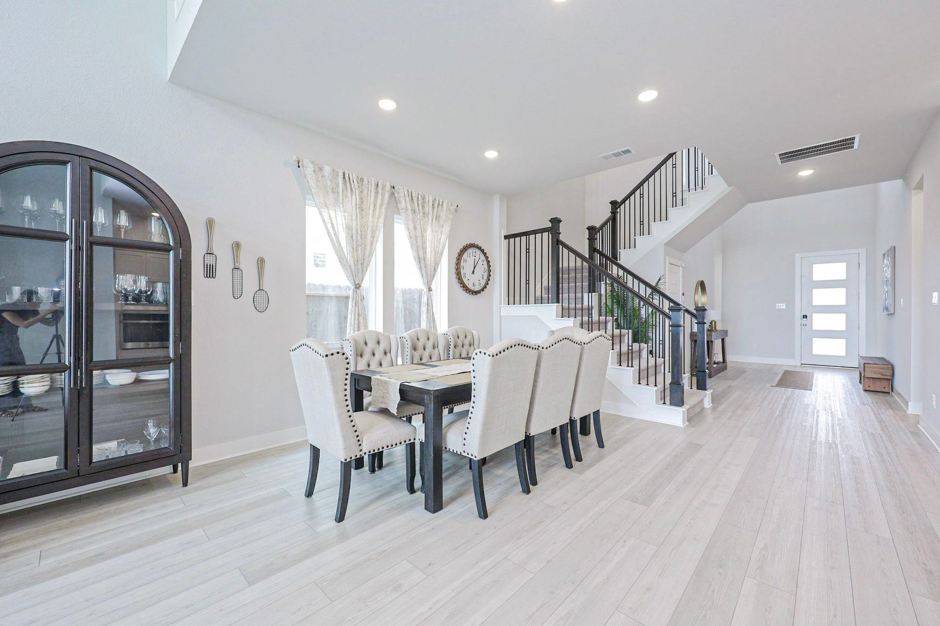 29651 Bur Creek Lane, Fulshear, TX 77441 Elegant and spacious dining area apt for 8 seating table. The two large windows provide more natural light.