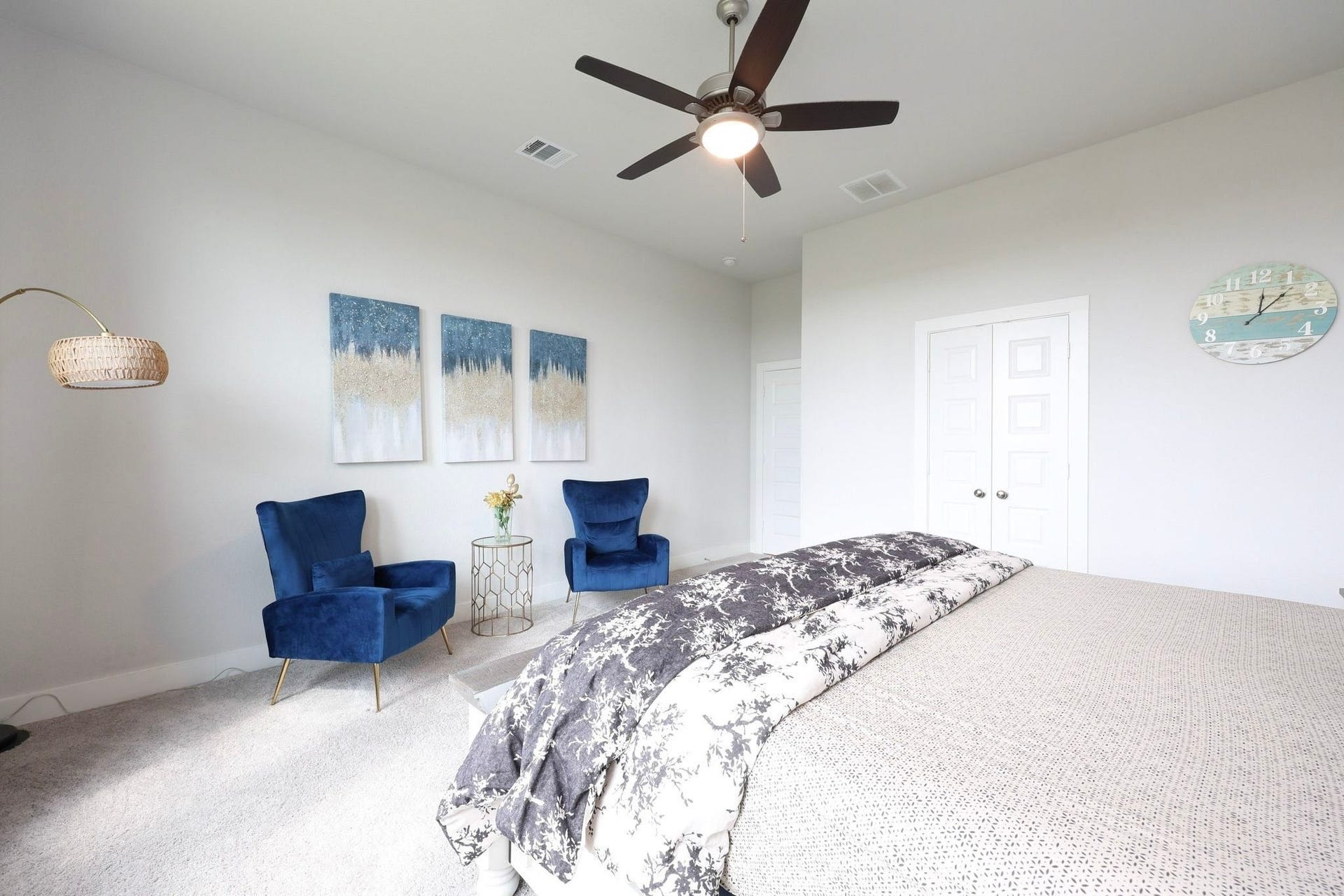 29651 Bur Creek Lane, Fulshear, TX 77441 Spacious primary bedroom with a ceiling fan, creating a serene and inviting atmosphere.