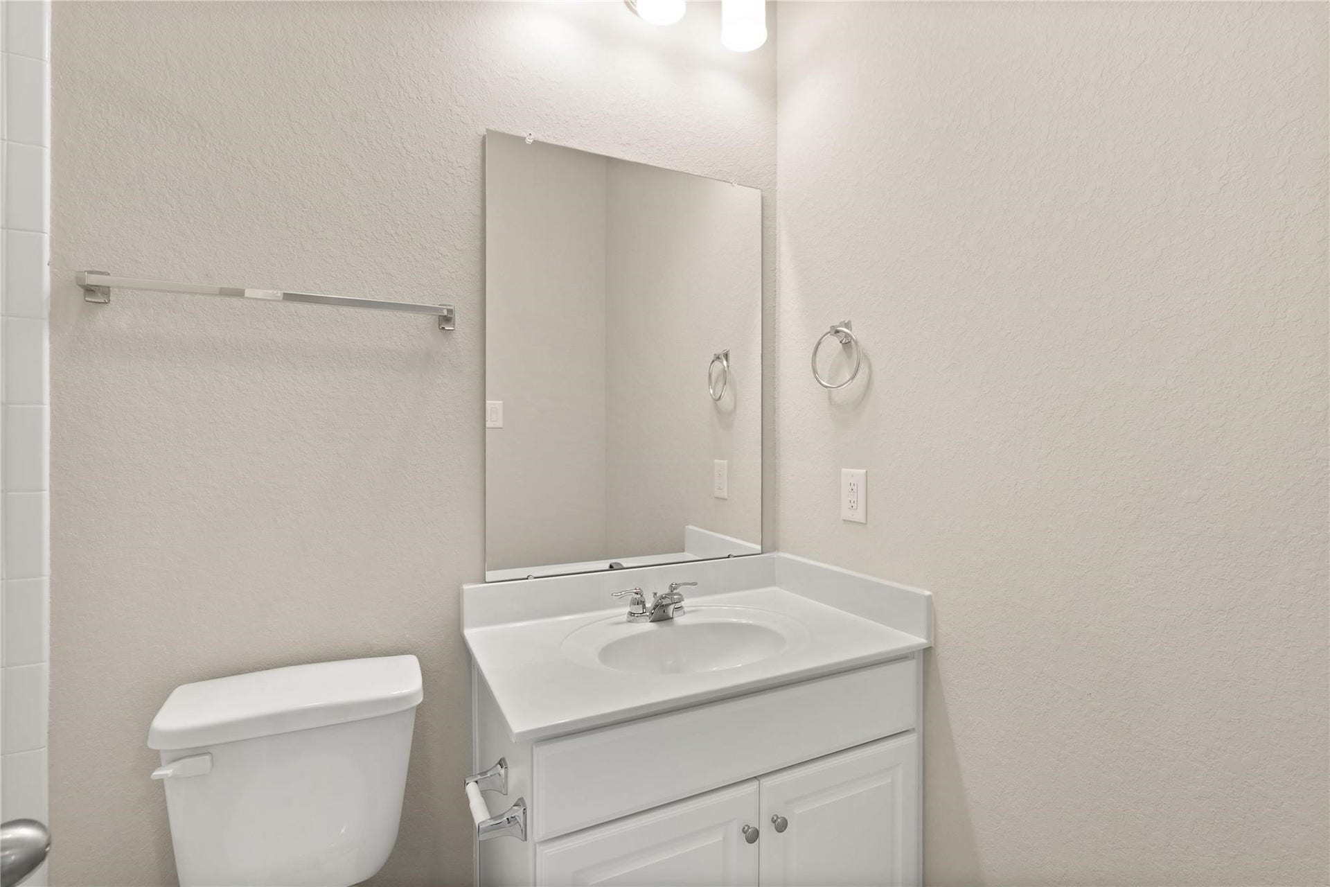 2459 Solaris Bend Drive, Katy, TX 77493 This secondary bathroom features tile flooring, white cabinetry and light counter tops, and shower-tub combo.