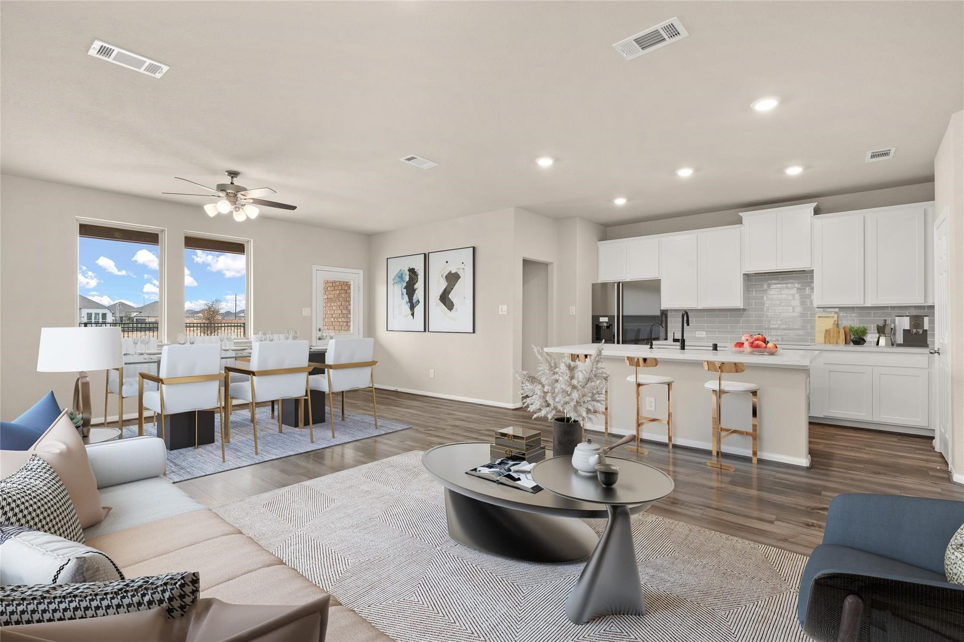 2459 Solaris Bend Drive, Katy, TX 77493 The open concept design seamlessly connects the kitchen tot he dining and family area making it the heart of the home and perfect for entertaining family and friends....Virtually staged
