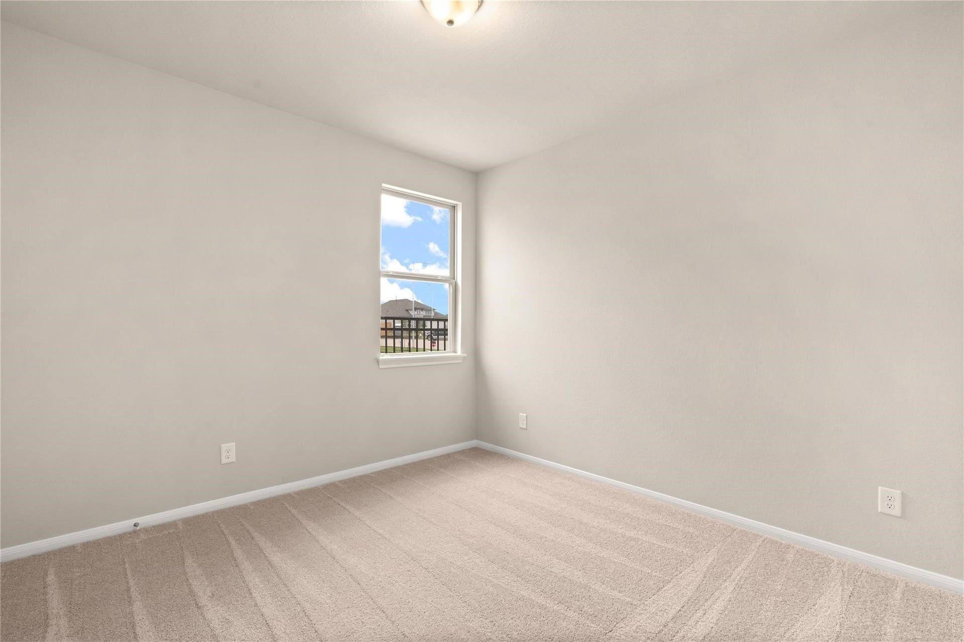 2459 Solaris Bend Drive, Katy, TX 77493 This secondary bedroom is perfect for an in-law suite. Featuring plush carpet, fresh paint, closet, large window, and has direct access to the secondary bathroom.