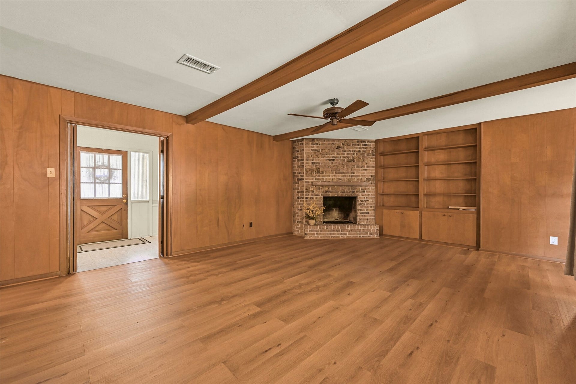 2101 Willow Dell Drive, Seabrook, TX 77586 Another view of the den showing the fireplace and built in bookshelves
