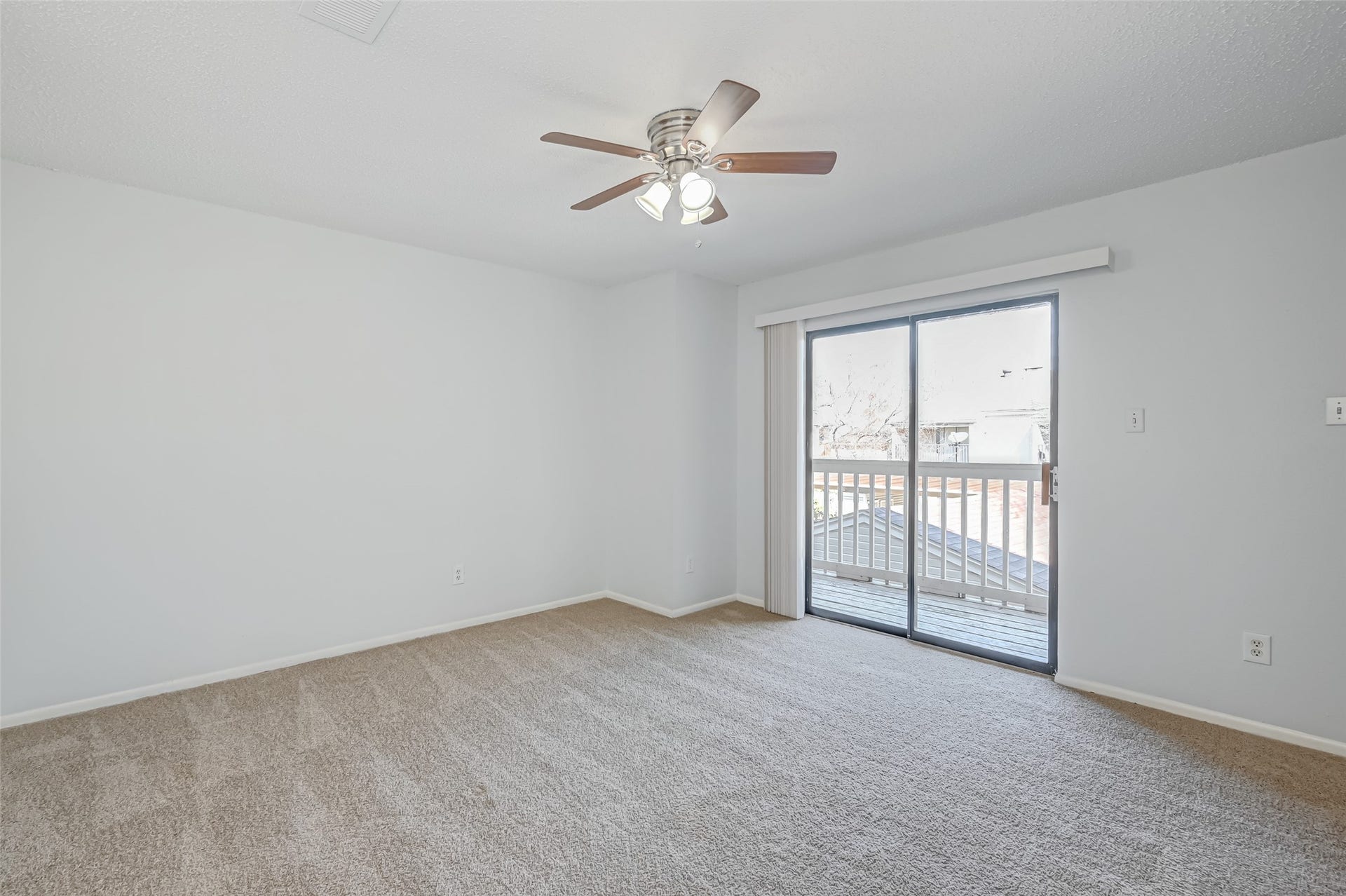 Bedroom with balcony access