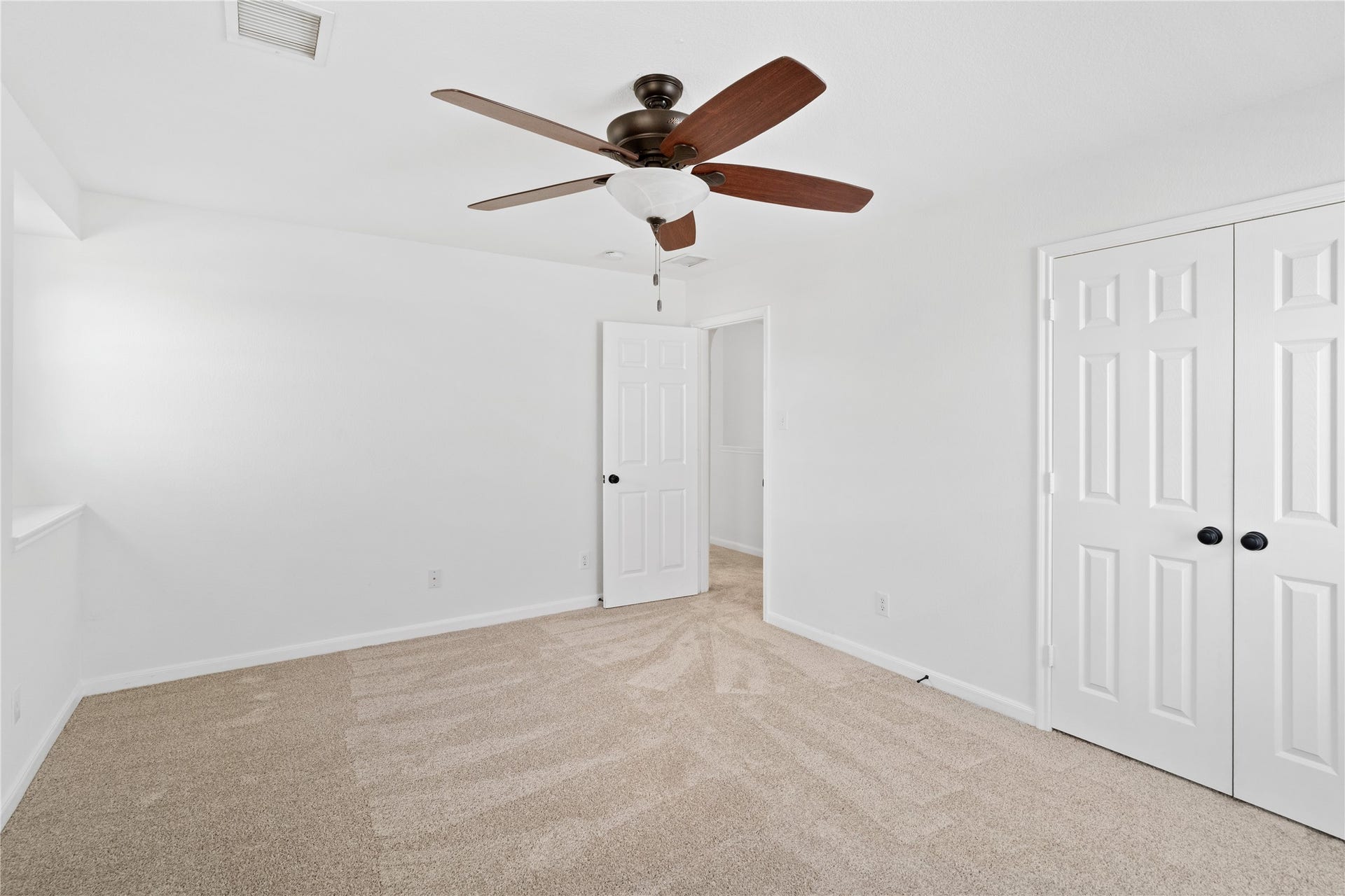 21611 Manitou Falls Lane, Katy, TX 77449 Bedroom Another view showcases the rooms closet storage, clean neutral palette, and ample floor space for flexible furniture placement.