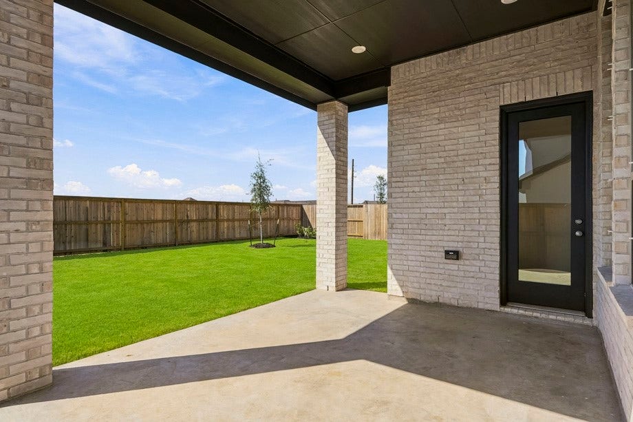 6430 Mahogany Branch Trail, Manvel, TX 77578 Enjoy your morning coffee on the extended patio.