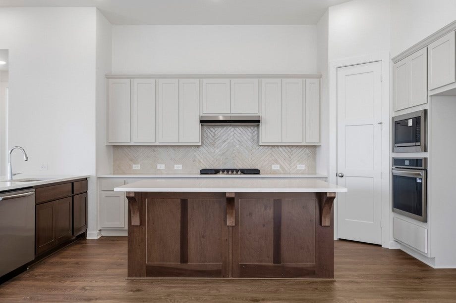 6430 Mahogany Branch Trail, Manvel, TX 77578 Kitchen has plenty of space for hosting.