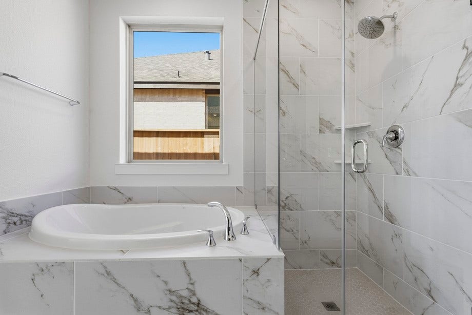 6430 Mahogany Branch Trail, Manvel, TX 77578 A soaking tub to unwind at the end of the day.