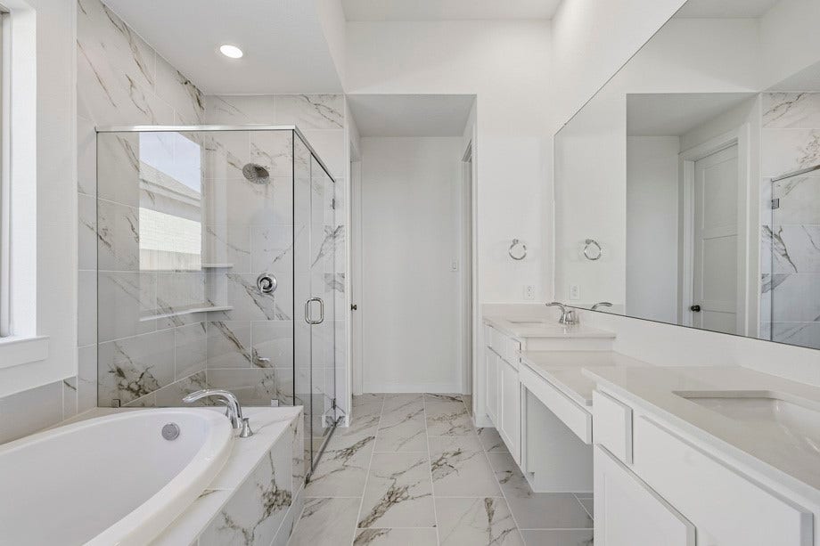 6430 Mahogany Branch Trail, Manvel, TX 77578 Primary bathroom features vanity area, perfect for getting ready.