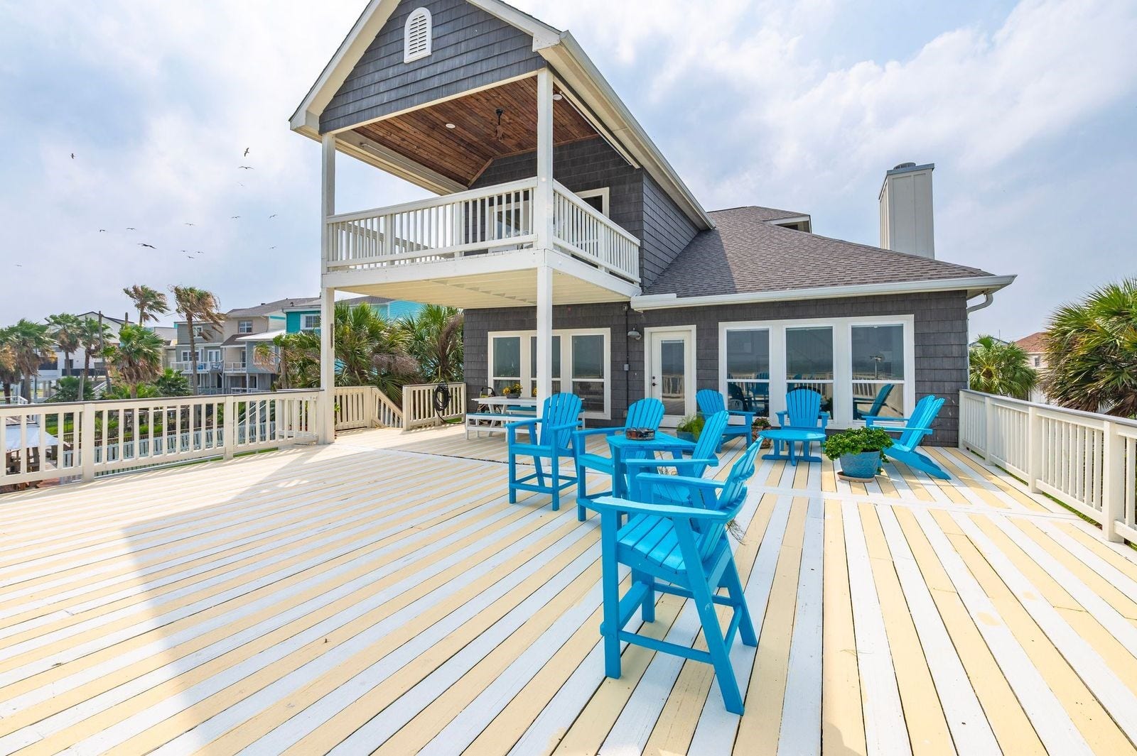 12 Tiki Circle, Tiki Island, TX 77554 Step outside to expansive waterfront decks where morning coffee is paired with tranquil sunrises and evenings end with spectacular coastal sunsets.
