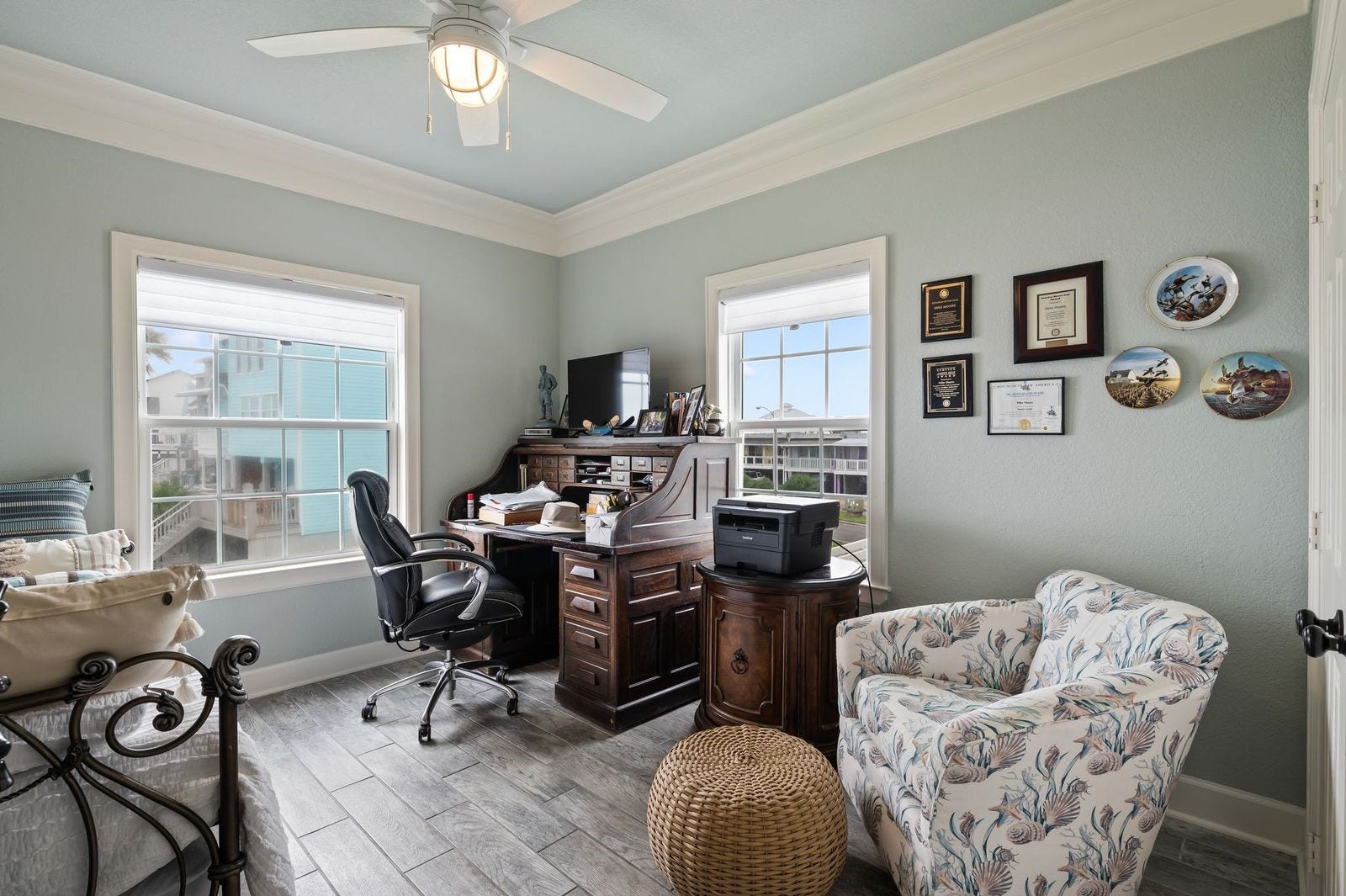 12 Tiki Circle, Tiki Island, TX 77554 A Private Sanctuary For Everyone! Secondary bedroom with crown molding, coastal colors and tile flooring.