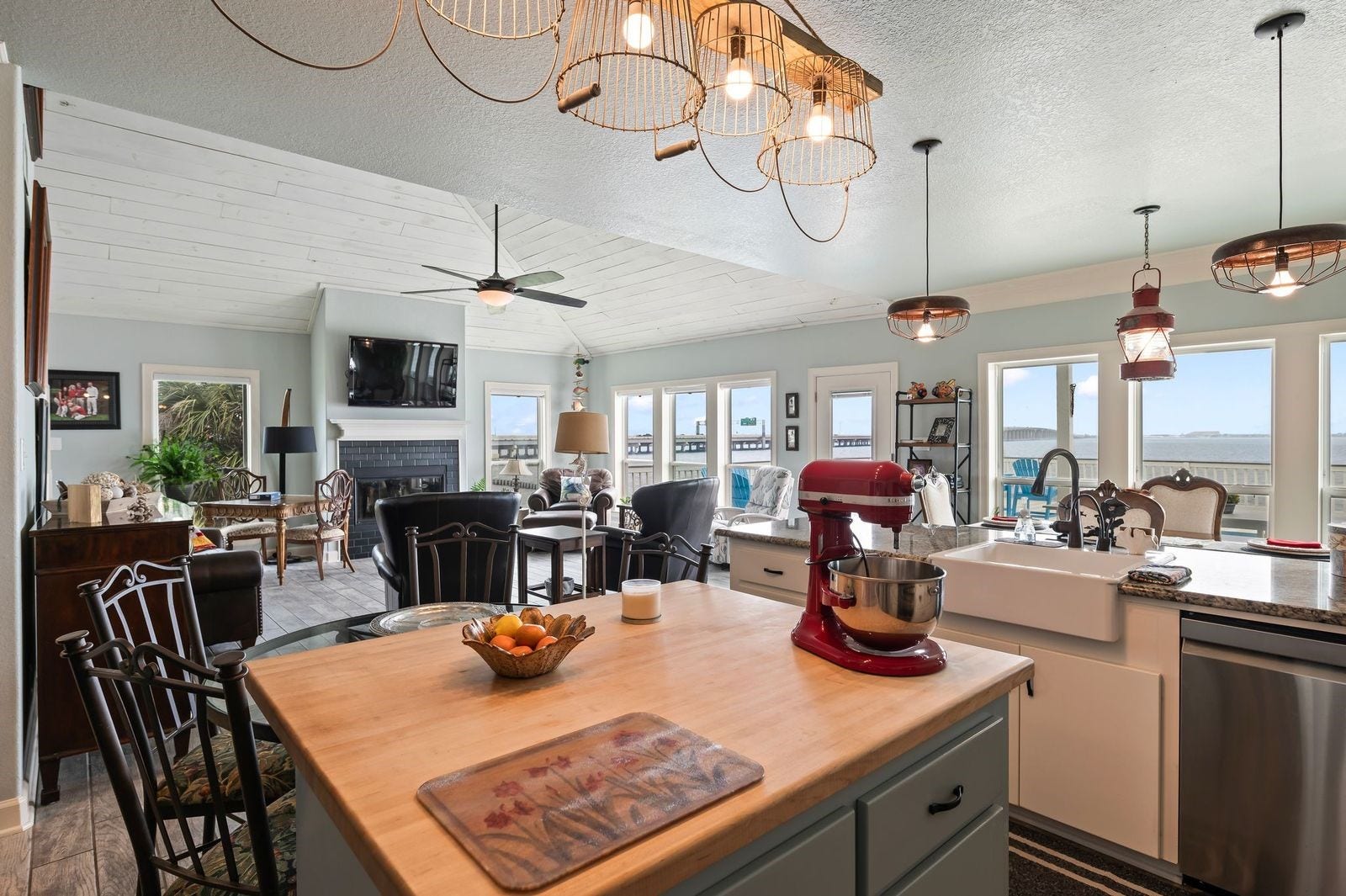 12 Tiki Circle, Tiki Island, TX 77554 Calling All Chefs! This spacious kitchen offers and a butcher block island, extensive countertop space and open concept.