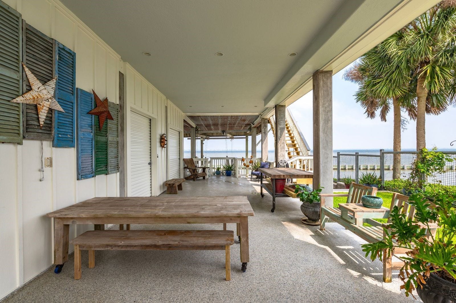 12 Tiki Circle, Tiki Island, TX 77554 Captivating Views & Spacious Exterior Design
