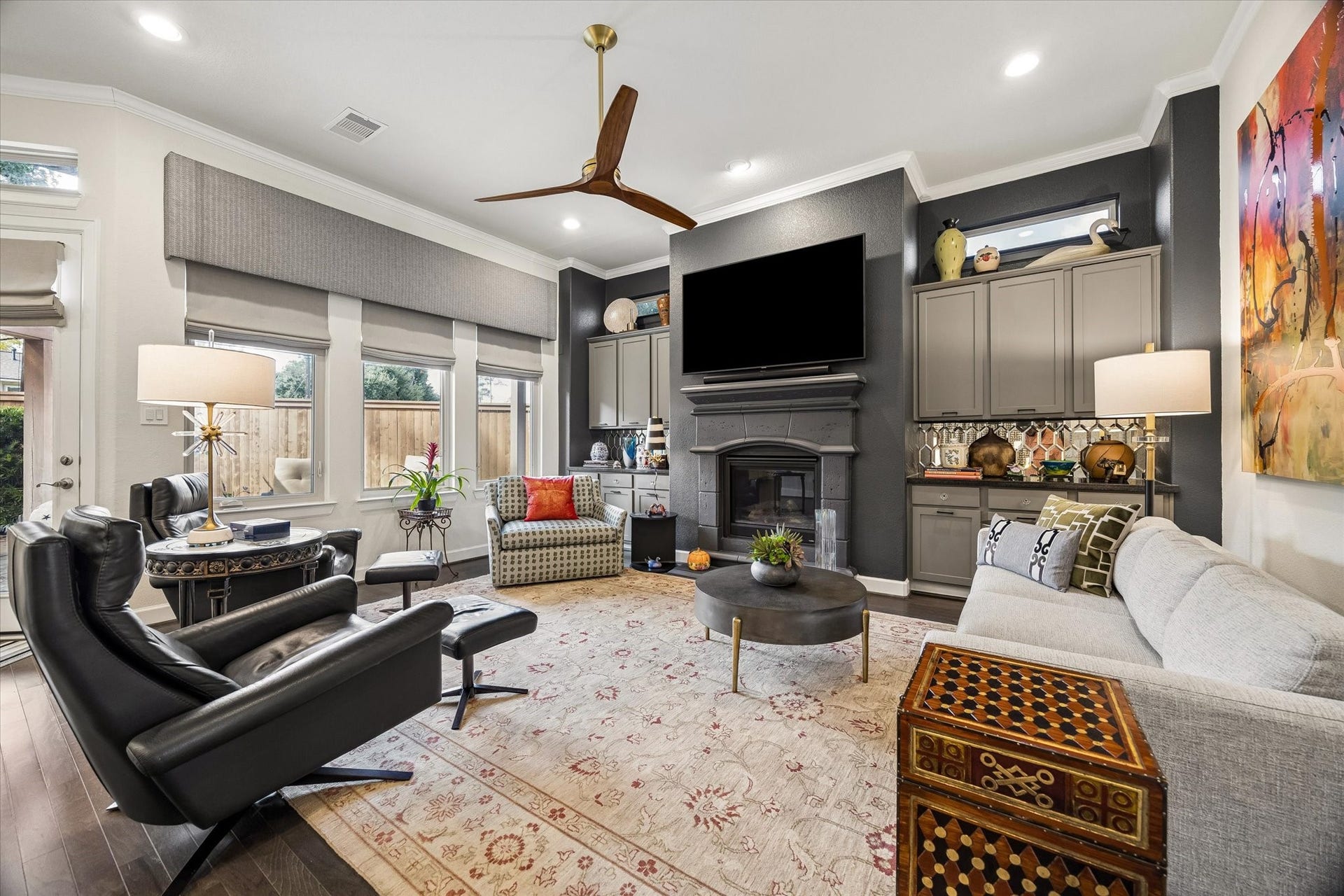 5103 W Lacey Garden Loop Loop, Houston, TX 77018 Spacious living room. fireplace w/side cabinets, electric shades.