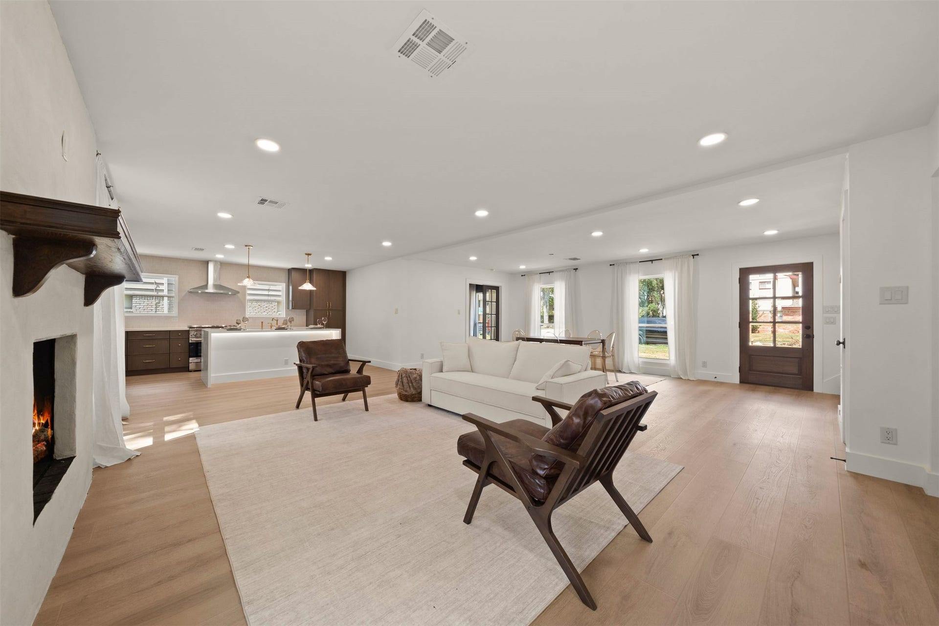 10111 Kerrwood Lane, Houston, TX 77080 Another angle of the living area, kitchen, dining.