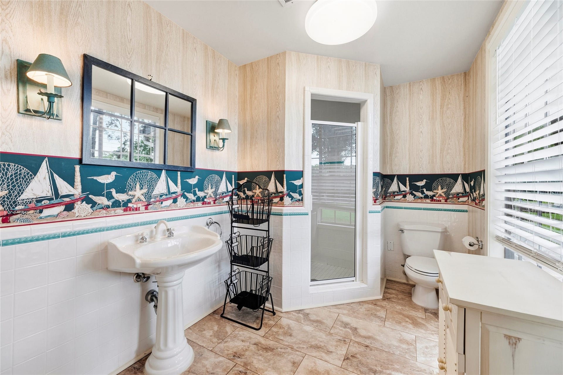 13131 Holston Hills Drive, Houston, TX 77069 Full bathroom accessible from the backyard - perfect for hosting at the pool and lake.