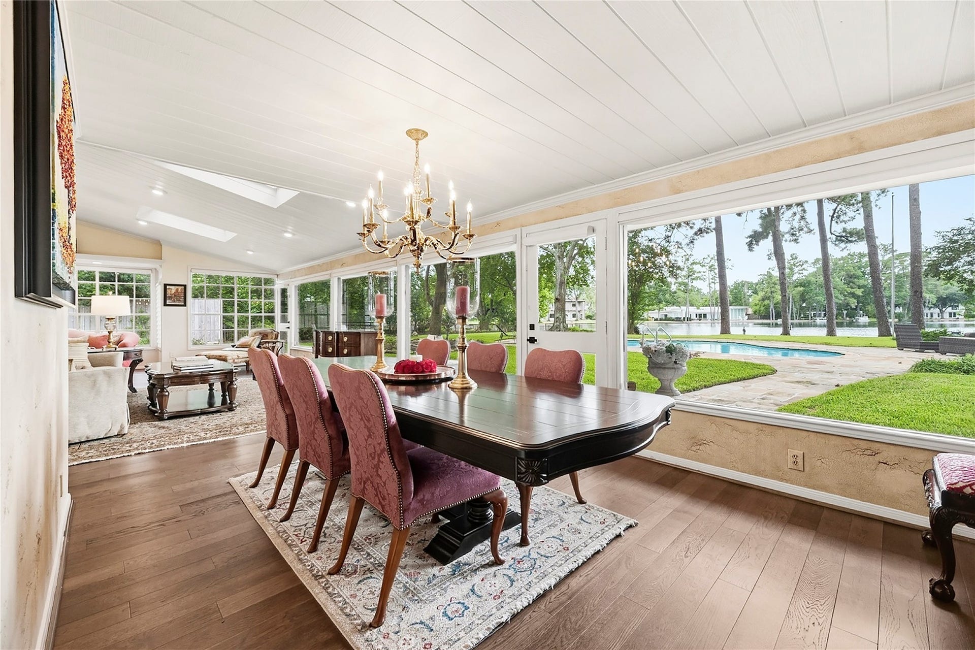 13131 Holston Hills Drive, Houston, TX 77069 Incredible formal dining space at the heart of the home, with a wall of windows overlooking 105' of private lakefront.