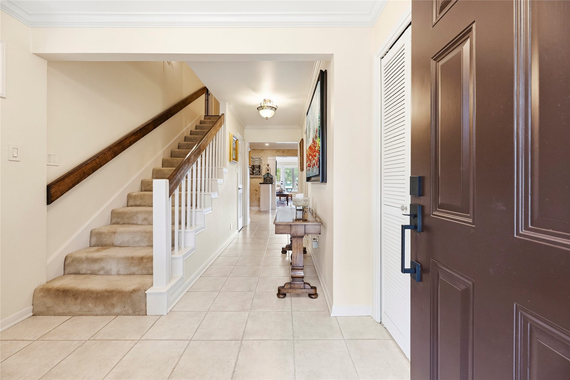 13131 Holston Hills Drive, Houston, TX 77069 Welcome home! One of Two staircases greet you.