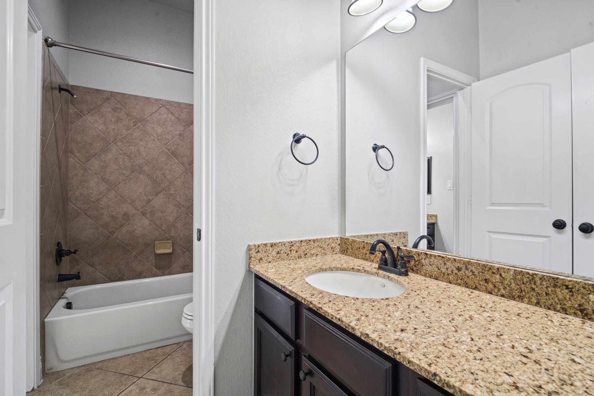 9819 St Romain Drive, Katy, TX 77494 Jack and Jill upstairs bathroom.