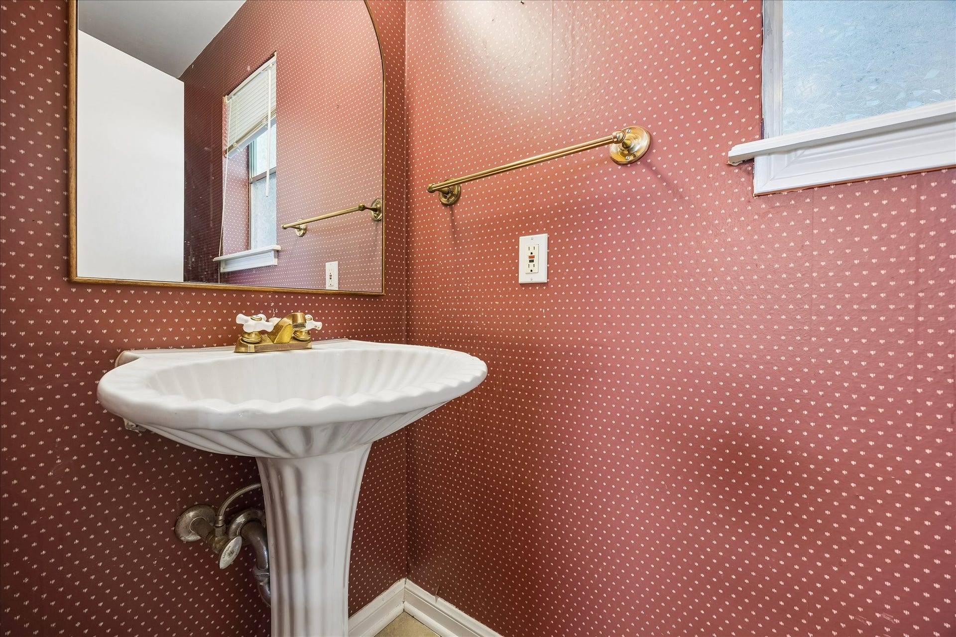 7626 Meadowvale Drive, Houston, TX 77063 The half bath is off the utility room in the back of the home.