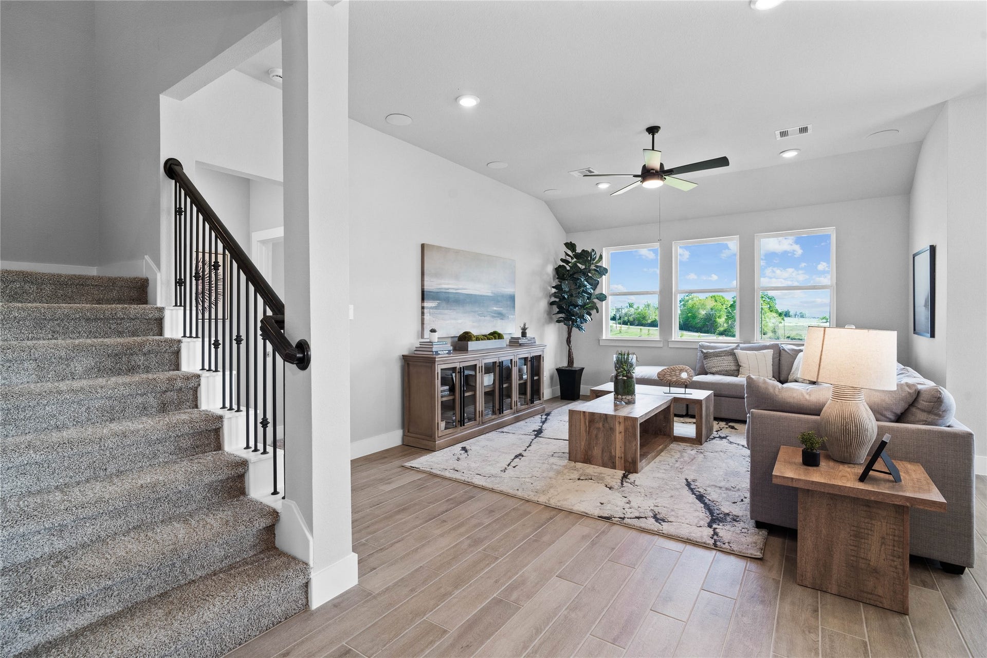 19608 Montgomery Ridge Way, Montgomery, TX 77316 Just beyond the entryway, a radiant, open-concept Great Room unfolds, immediately establishing itself as the heart of the home and the ultimate gathering spot.
