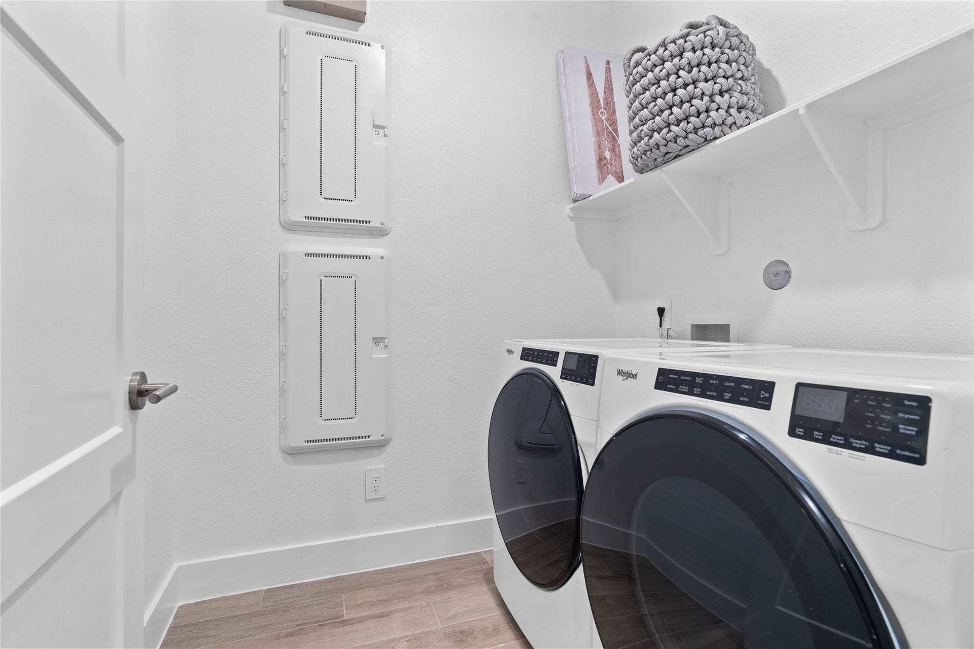 19608 Montgomery Ridge Way, Montgomery, TX 77316 This dedicated laundry room comes equipped with a washer and dryer set, ready for immediate use.