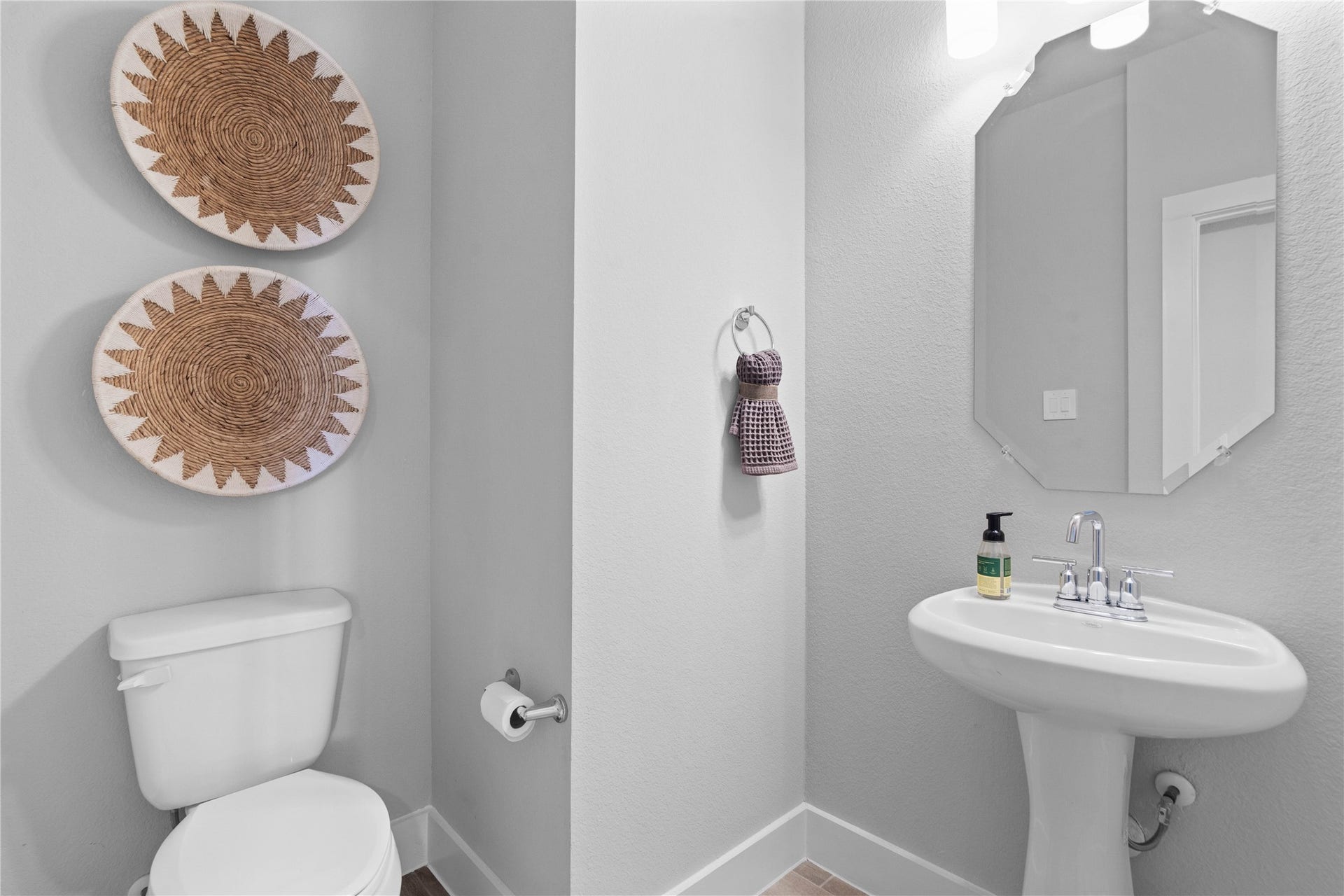 19608 Montgomery Ridge Way, Montgomery, TX 77316 Strategically located on the main level, this half-bath allows guests to freshen up easily without having to navigate through the private areas of the home, such as the bedrooms or personal full bathrooms.