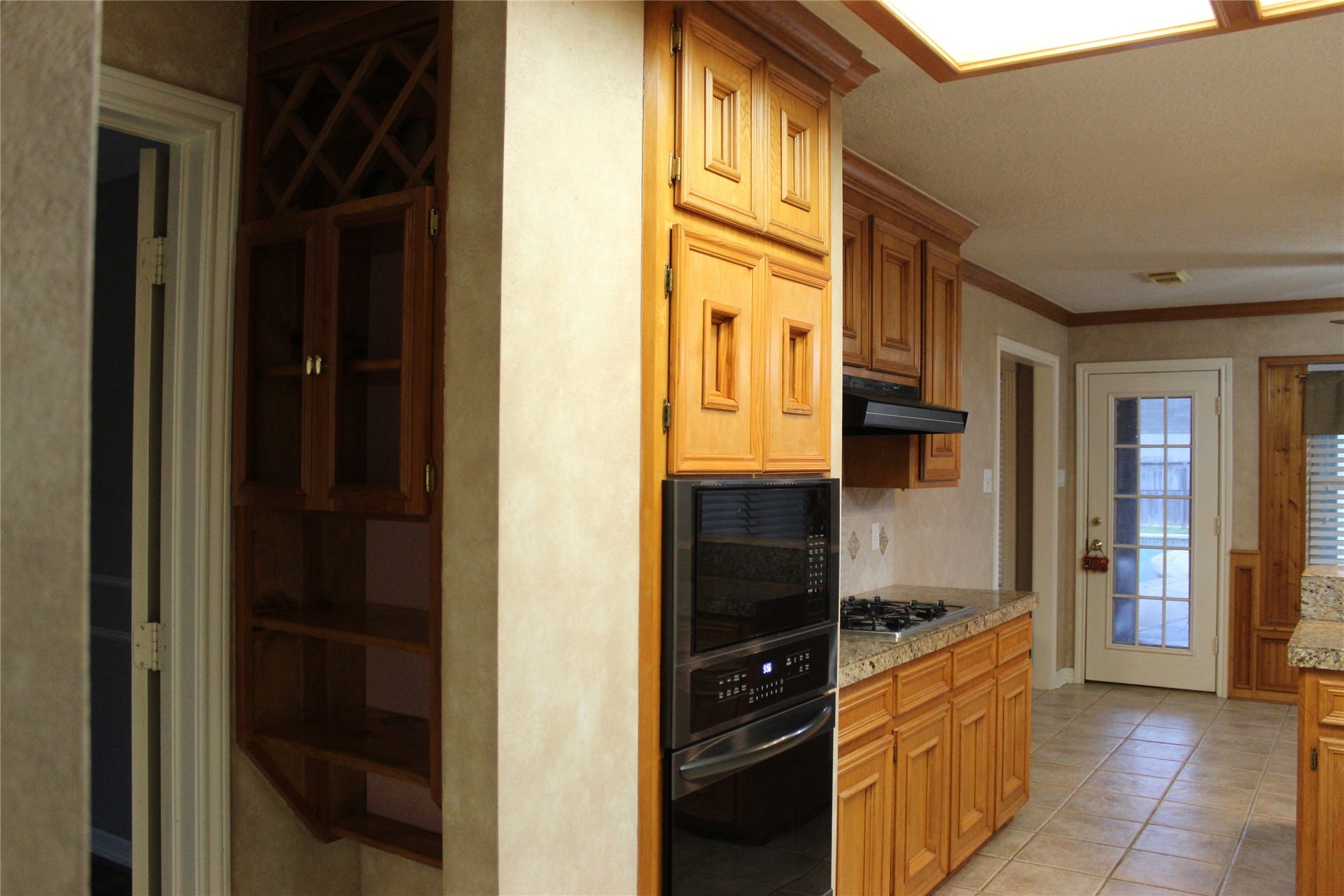 1107 Glenshannon Avenue, Friendswood, TX 77546 Built in wine storage in kitchen