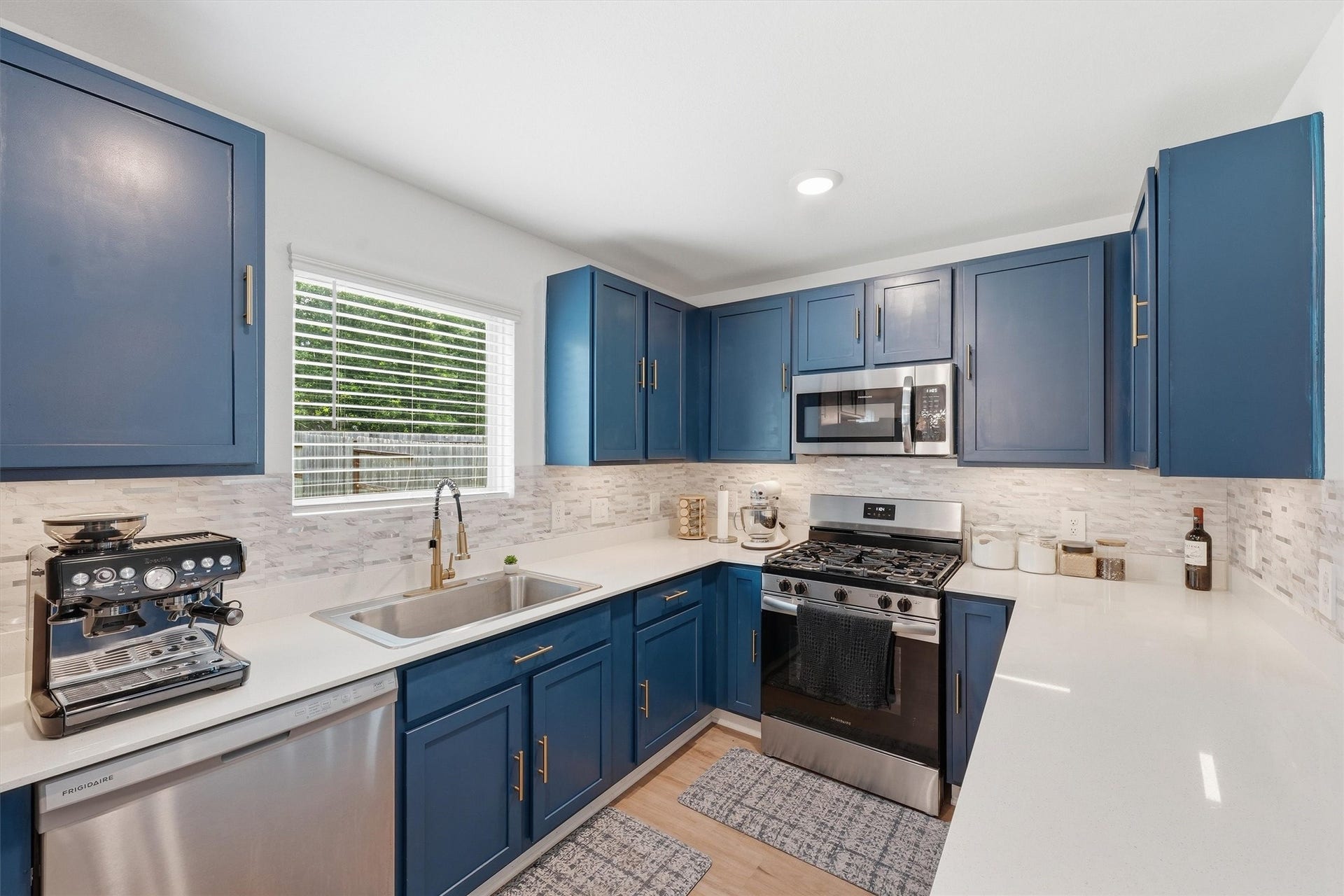 22479 Douglas Court, New Caney, TX 77357 Beautiful quartz countertops.