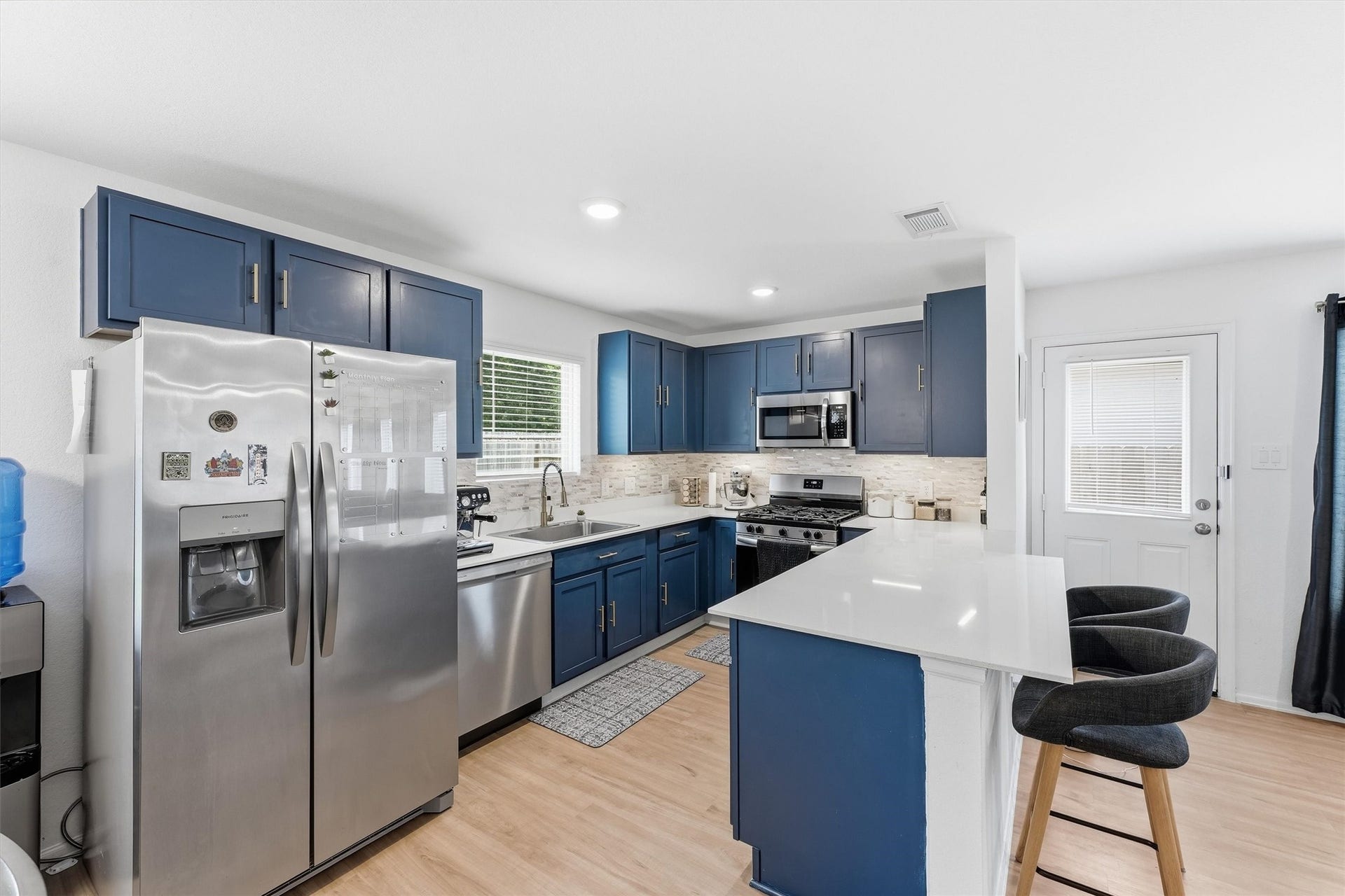 22479 Douglas Court, New Caney, TX 77357 Kitchen opens to the living room. Great for entertaining.