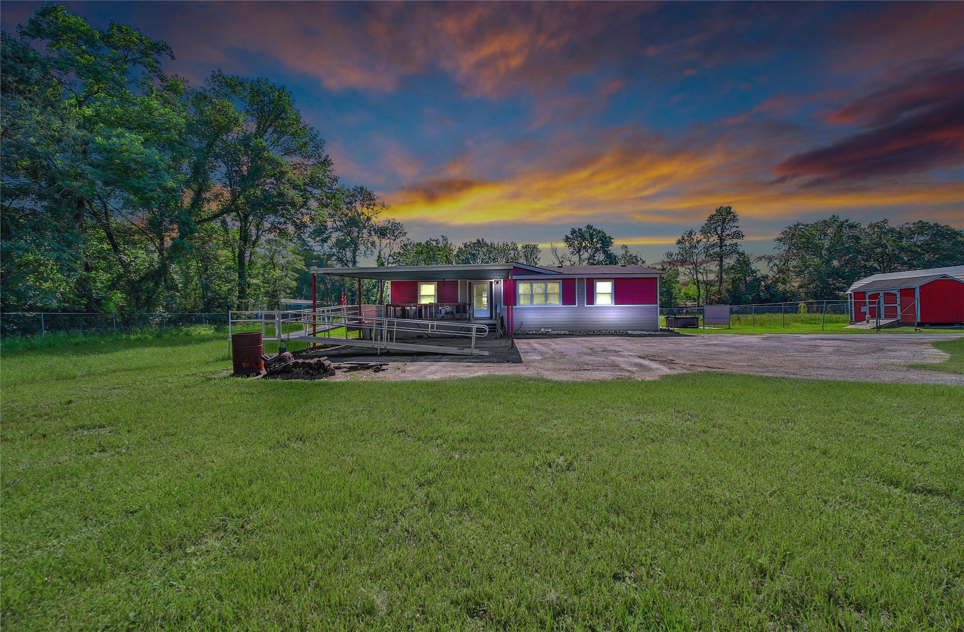 Residential Use in the Back Half of the Property with it's own driveway gate & fencing!