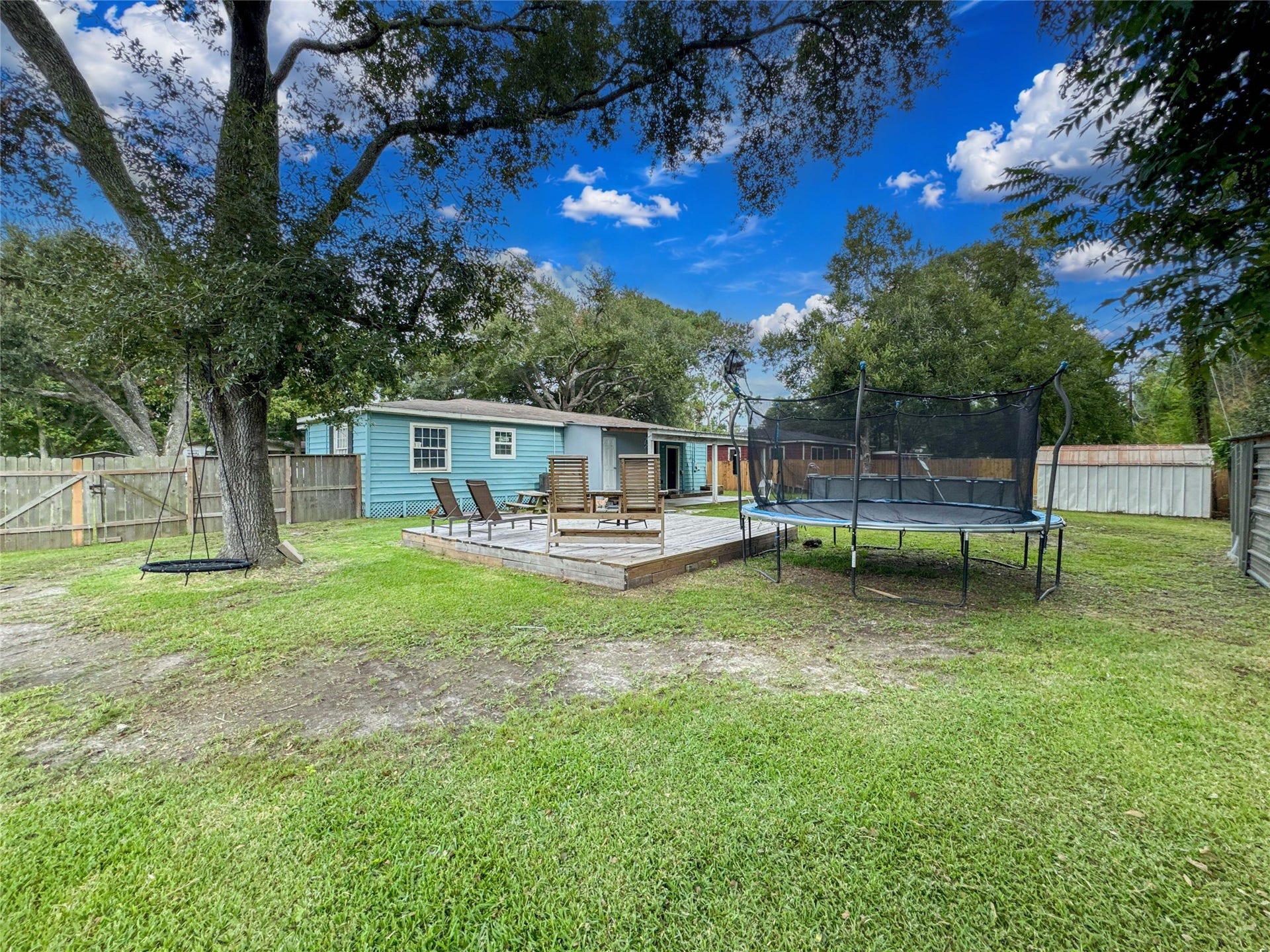 6737 E Bayou Drive, Hitchcock, TX 77563 Plenty room to run around with a brand new fence surrounding