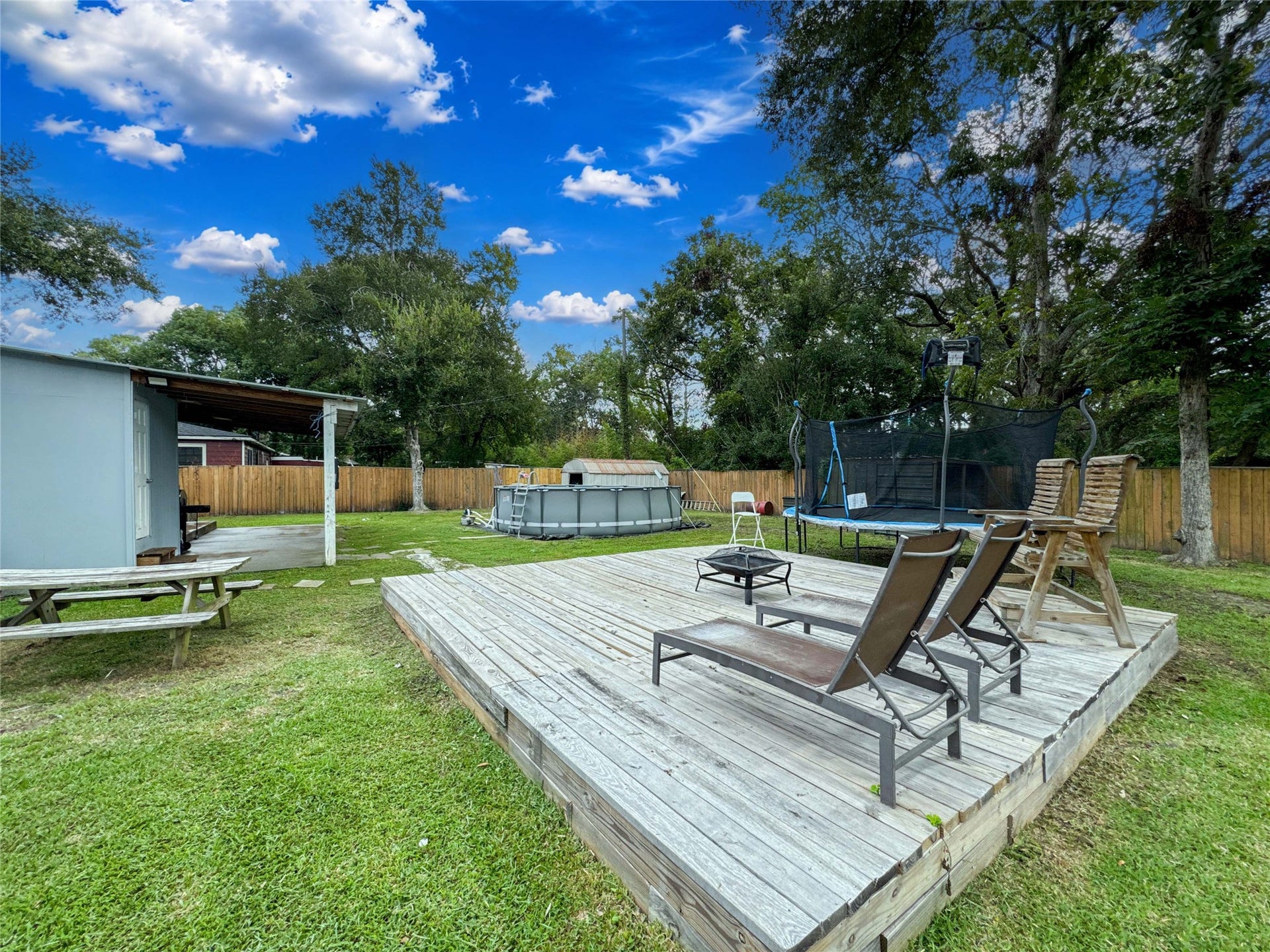 6737 E Bayou Drive, Hitchcock, TX 77563 Very spacious backyard perfect fot entertaining