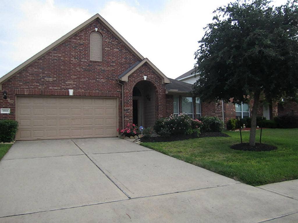 1011 Cove Crest Trail Trail, Fresno, TX 77545 3-sided brick and garage door opener