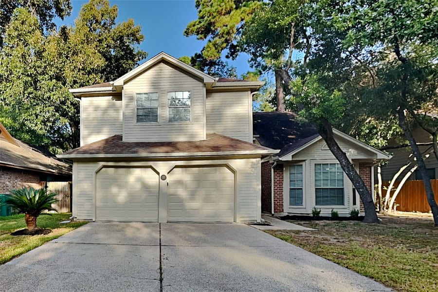 Property photo for 22 S Rain Forest Court, Spring, TX