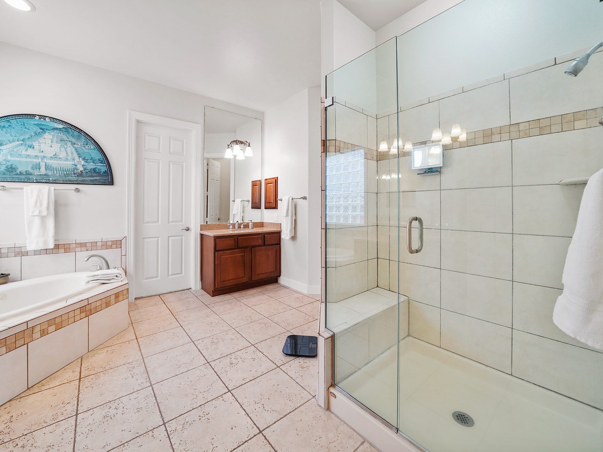 25610 Skye Springs Lane, Katy, TX 77494 Designed for a spa-like reset, the primary bath pairs a glass-enclosed shower with a spacious, light-filled layout.
