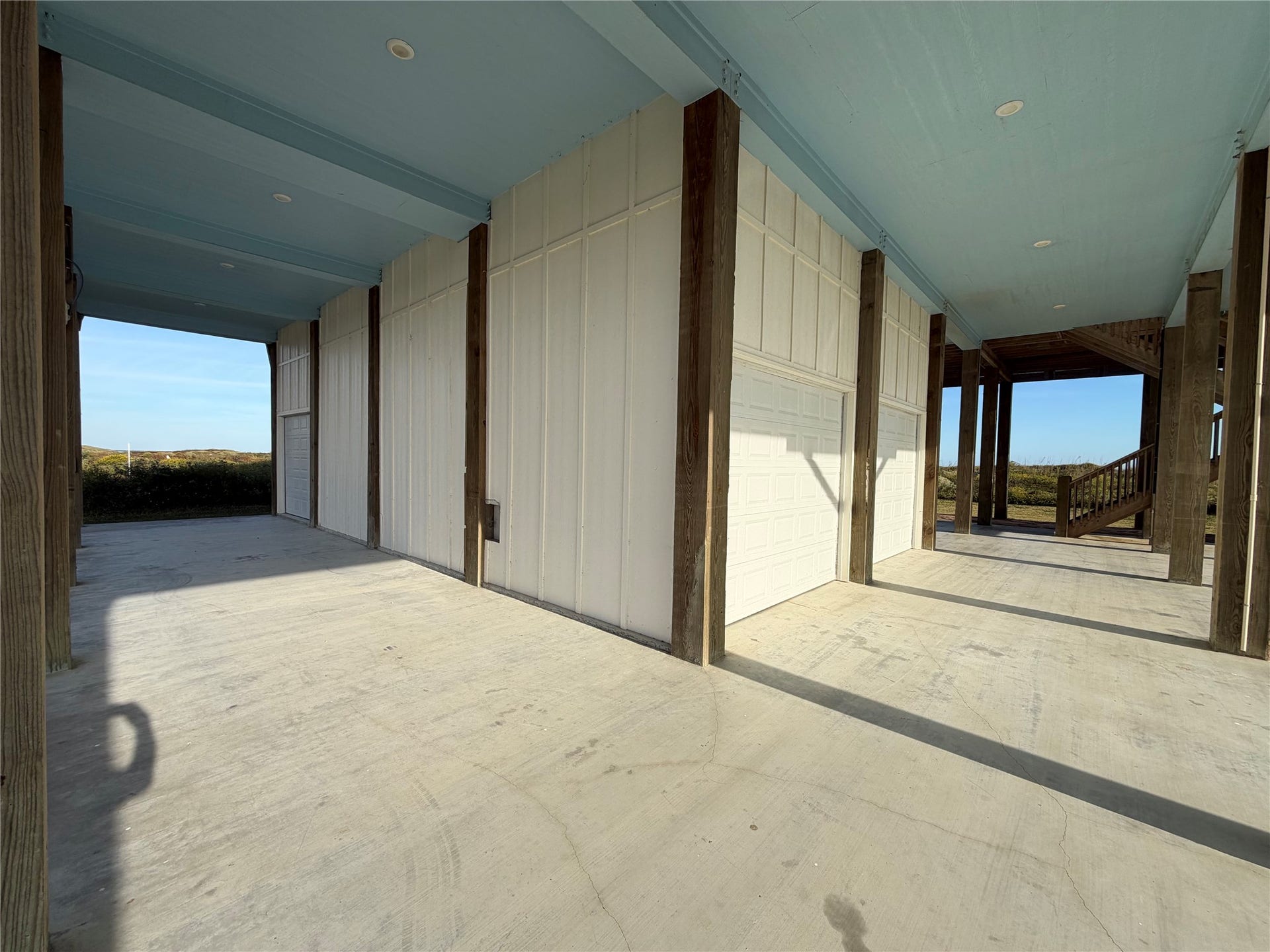715 Magnolia Lane, Port Bolivar, TX 77650 Corner view of large 2 bay garage