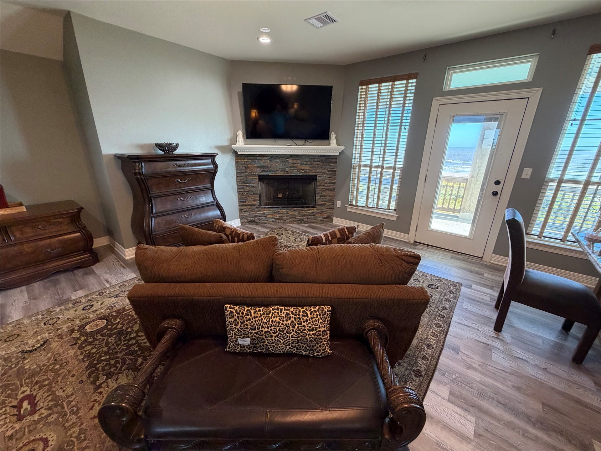 715 Magnolia Lane, Port Bolivar, TX 77650 View seating area with fireplace