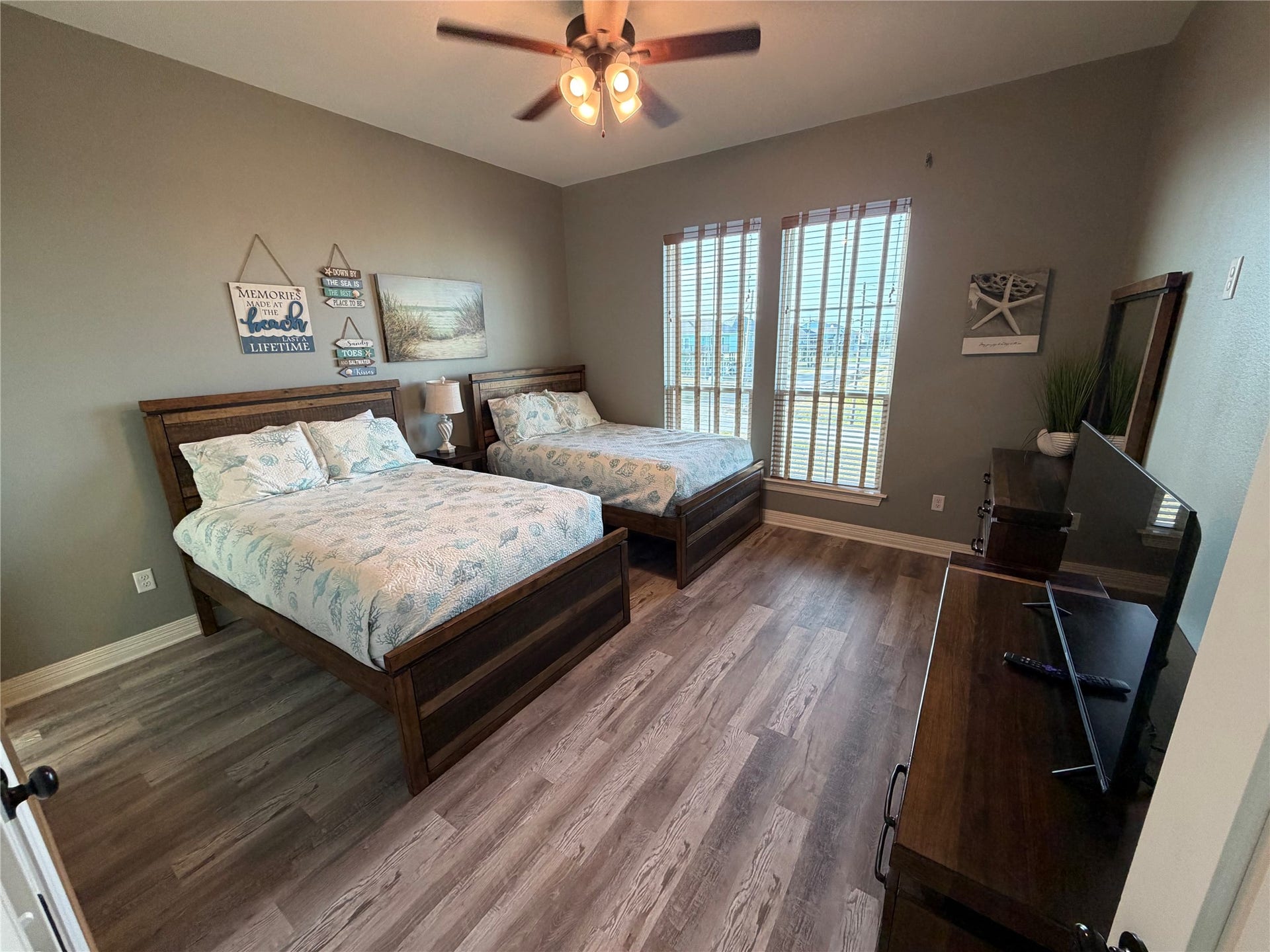 715 Magnolia Lane, Port Bolivar, TX 77650 Guest bedroom located north west corner of home with two full-size beds