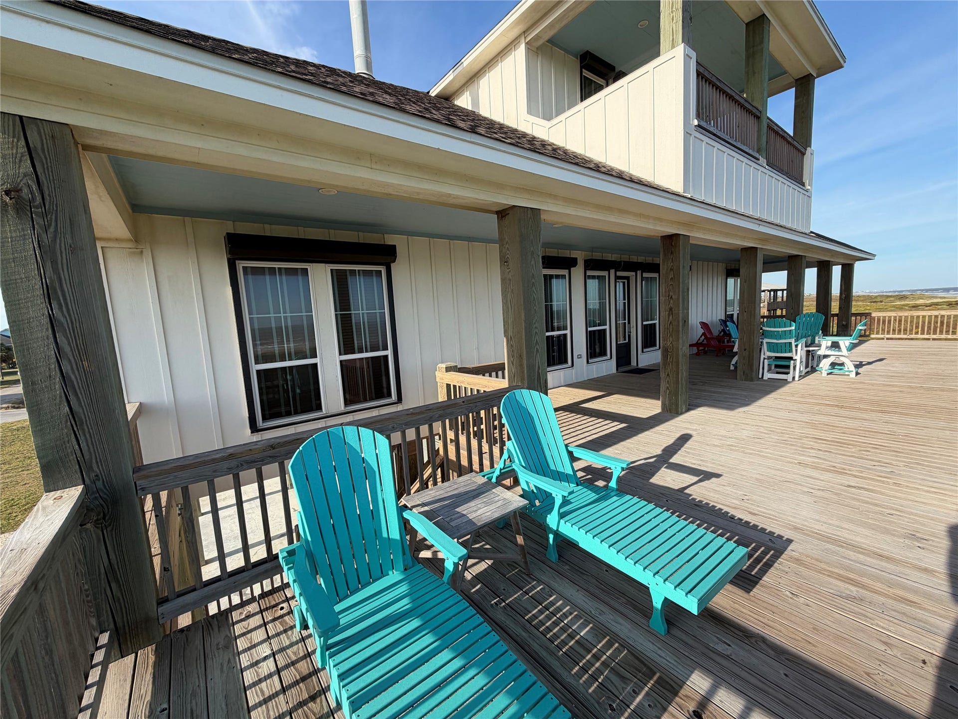 715 Magnolia Lane, Port Bolivar, TX 77650 Additional seating on partially covered deck