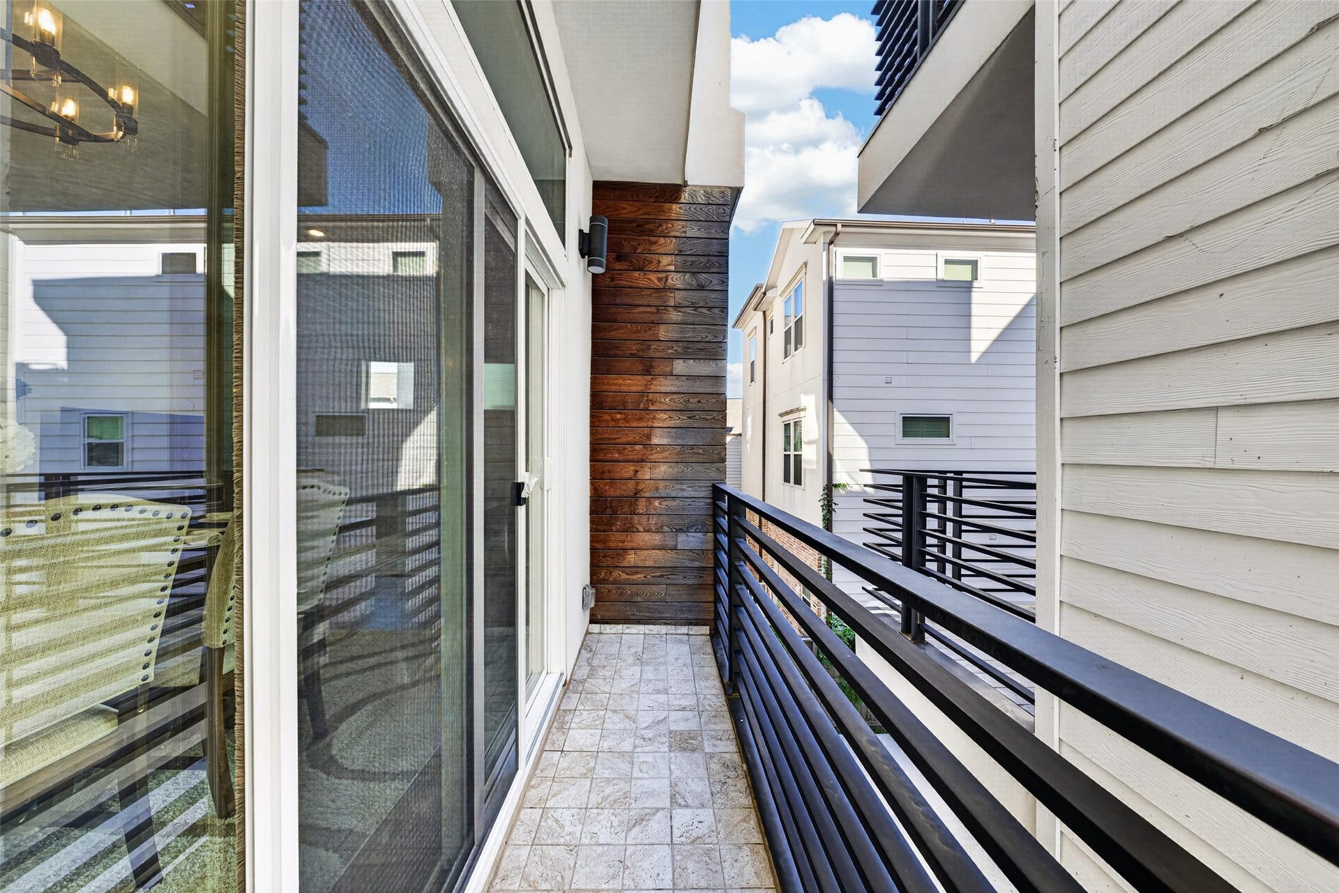 Private outdoor balcony off the dining room, ideal for morning coffee and fresh air.