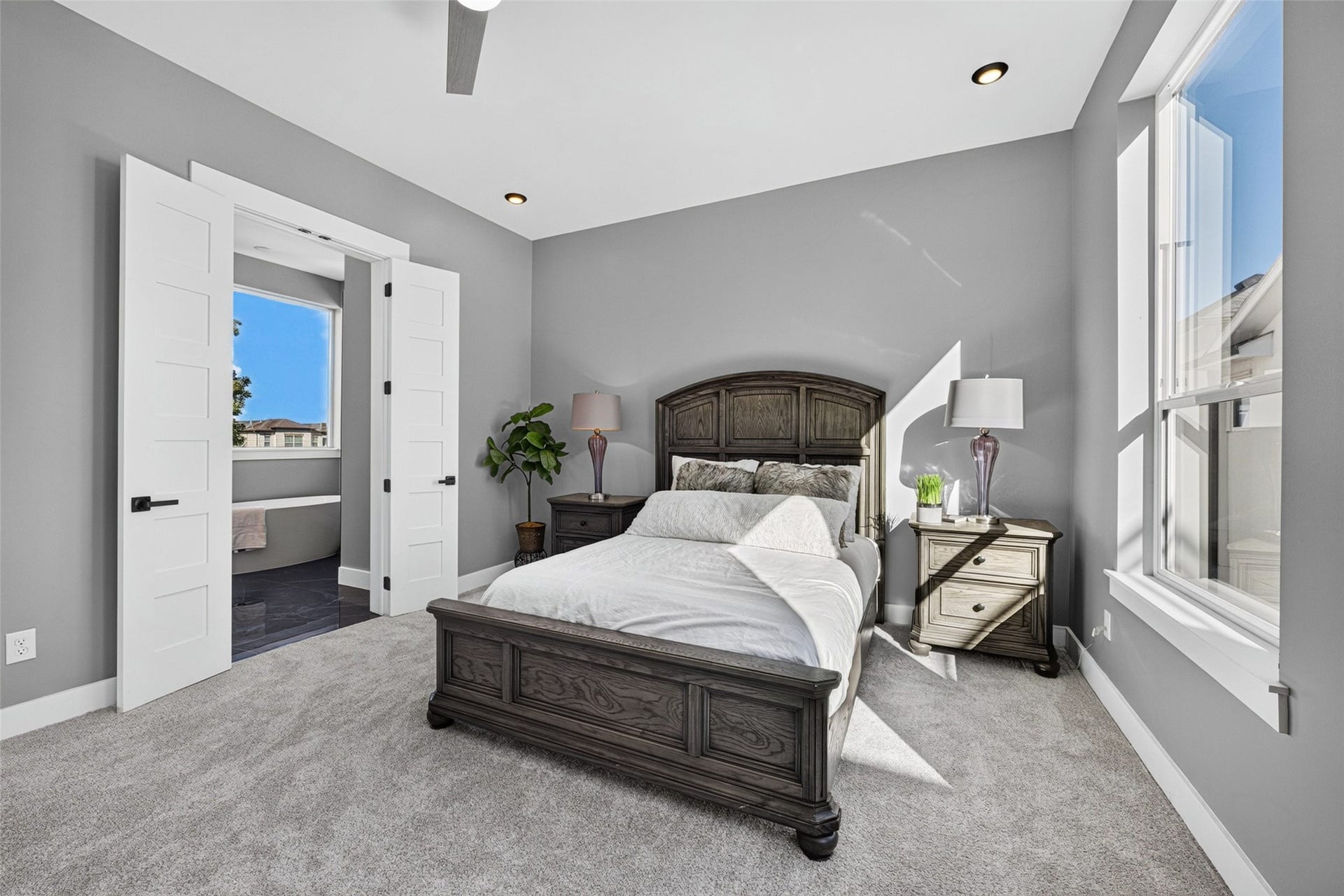 Wide windows flood the room with natural light, offering bright views and an airy atmosphere.