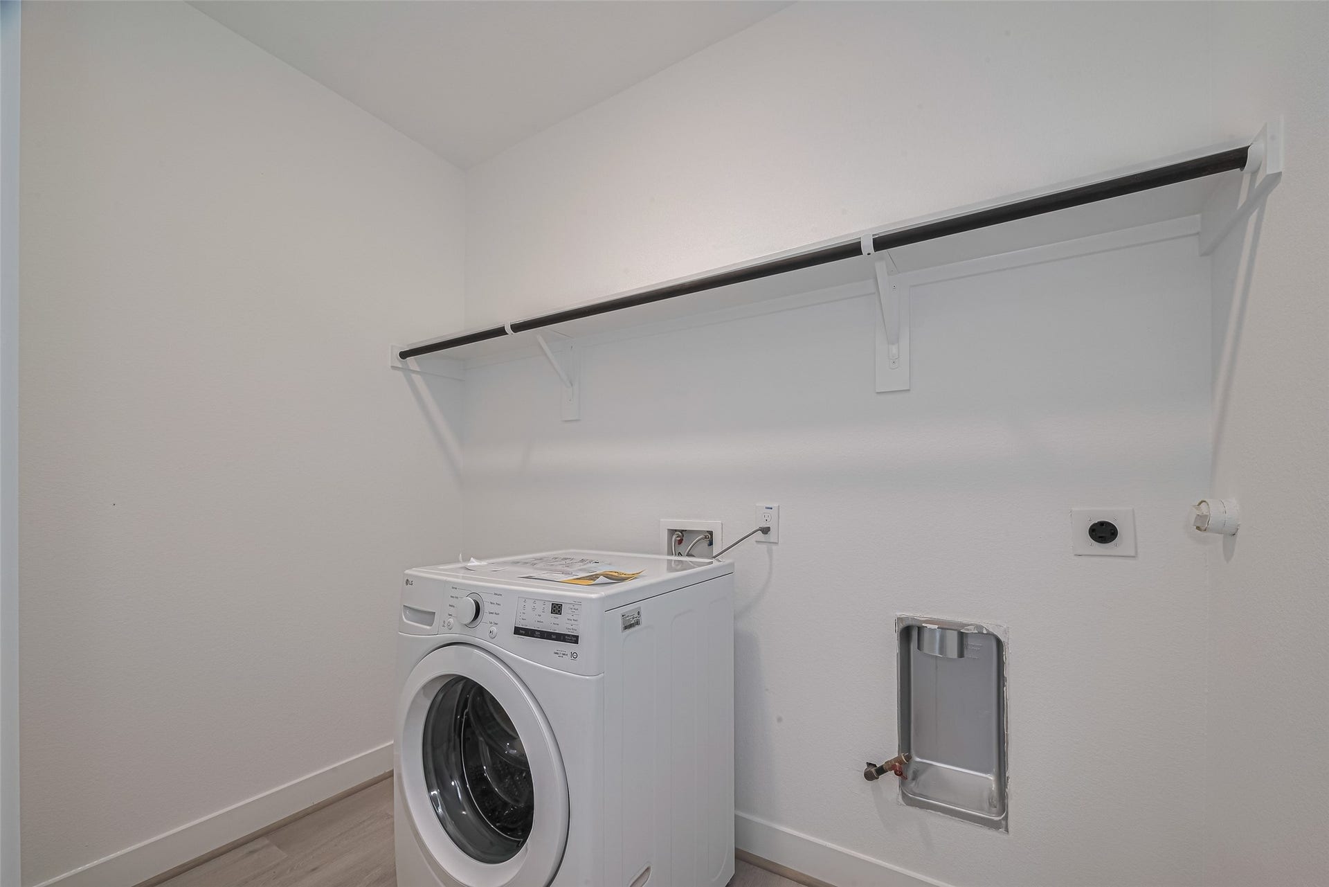 1354 W 24th Street, Houston, TX 77008 Another view of the utility room showcasing the available storage space.