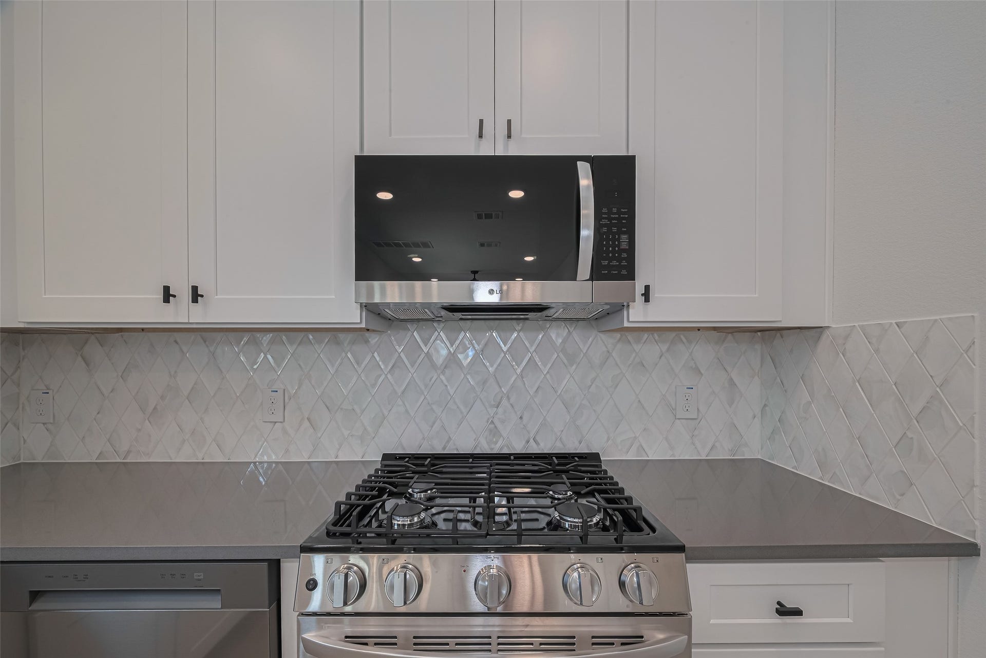 1354 W 24th Street, Houston, TX 77008 Additional kitchen view showcasing the clean design and ample cabinetry.