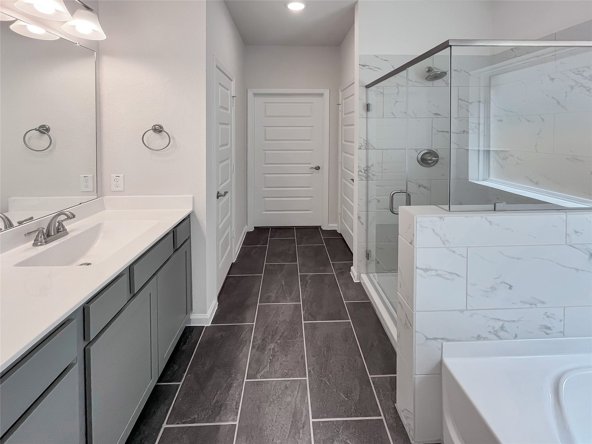 19107 Malatya Court, Montgomery, TX 77316 The Robin II- Owner's Bath with Separate Tub and Shower. Sample image to be used for example only.
