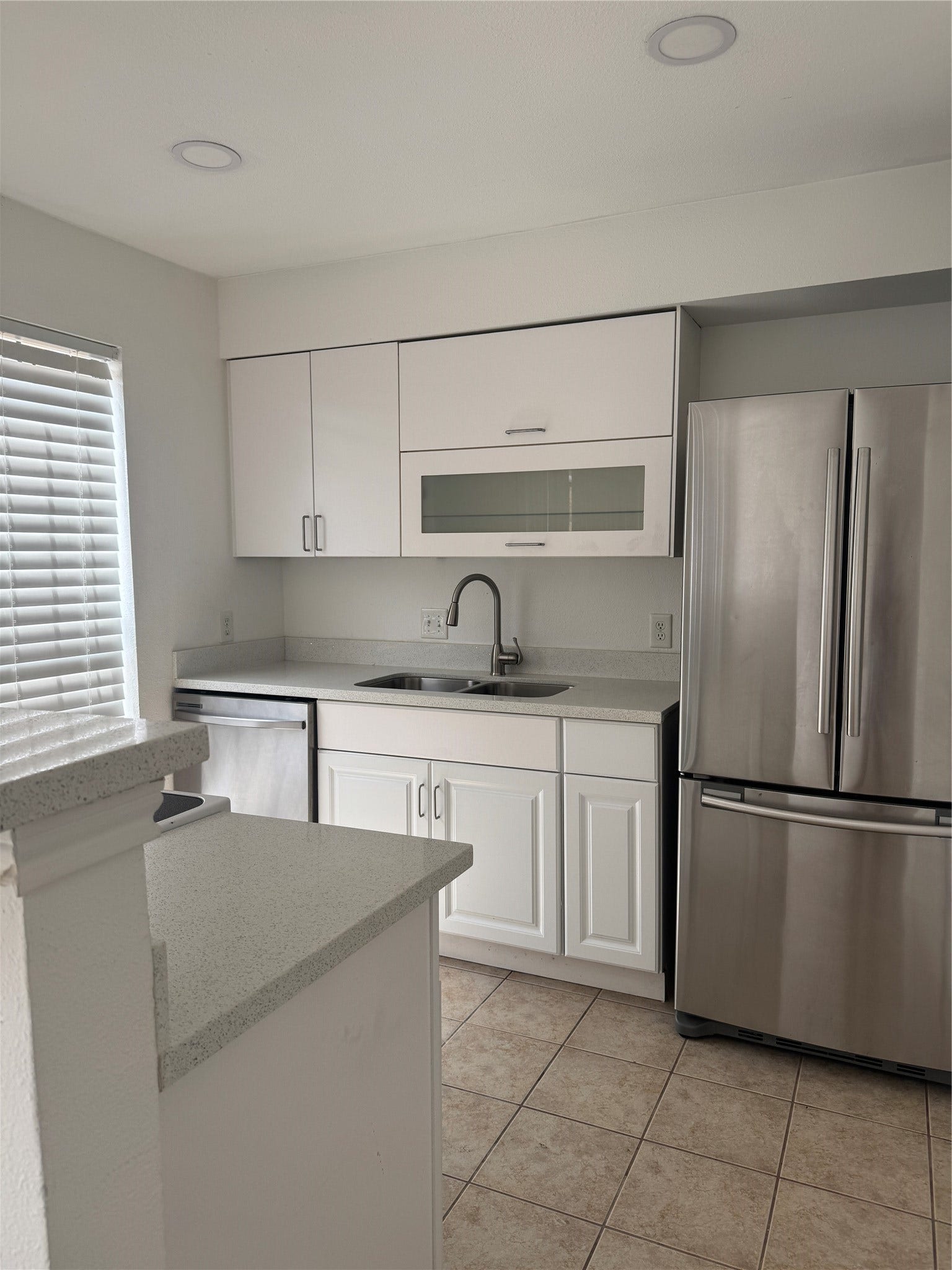 Clean clean clean.  Stainless appliances, new cabinets, and beautiful granite.