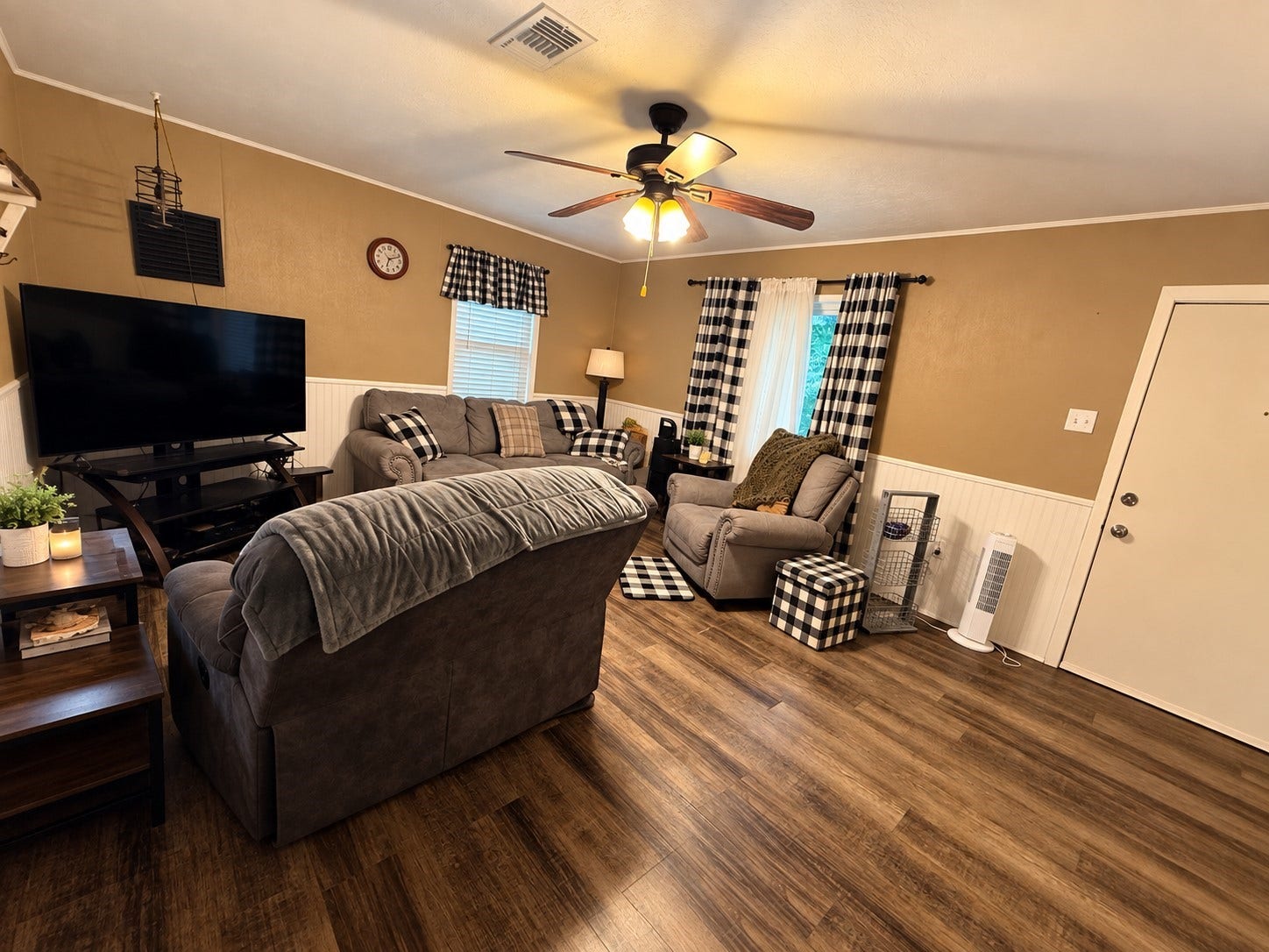 14440 Lakecrest Drive, Splendora, TX 77372 Living Room Wide view of the living area highlighting the open floor space, seating area and front entry.