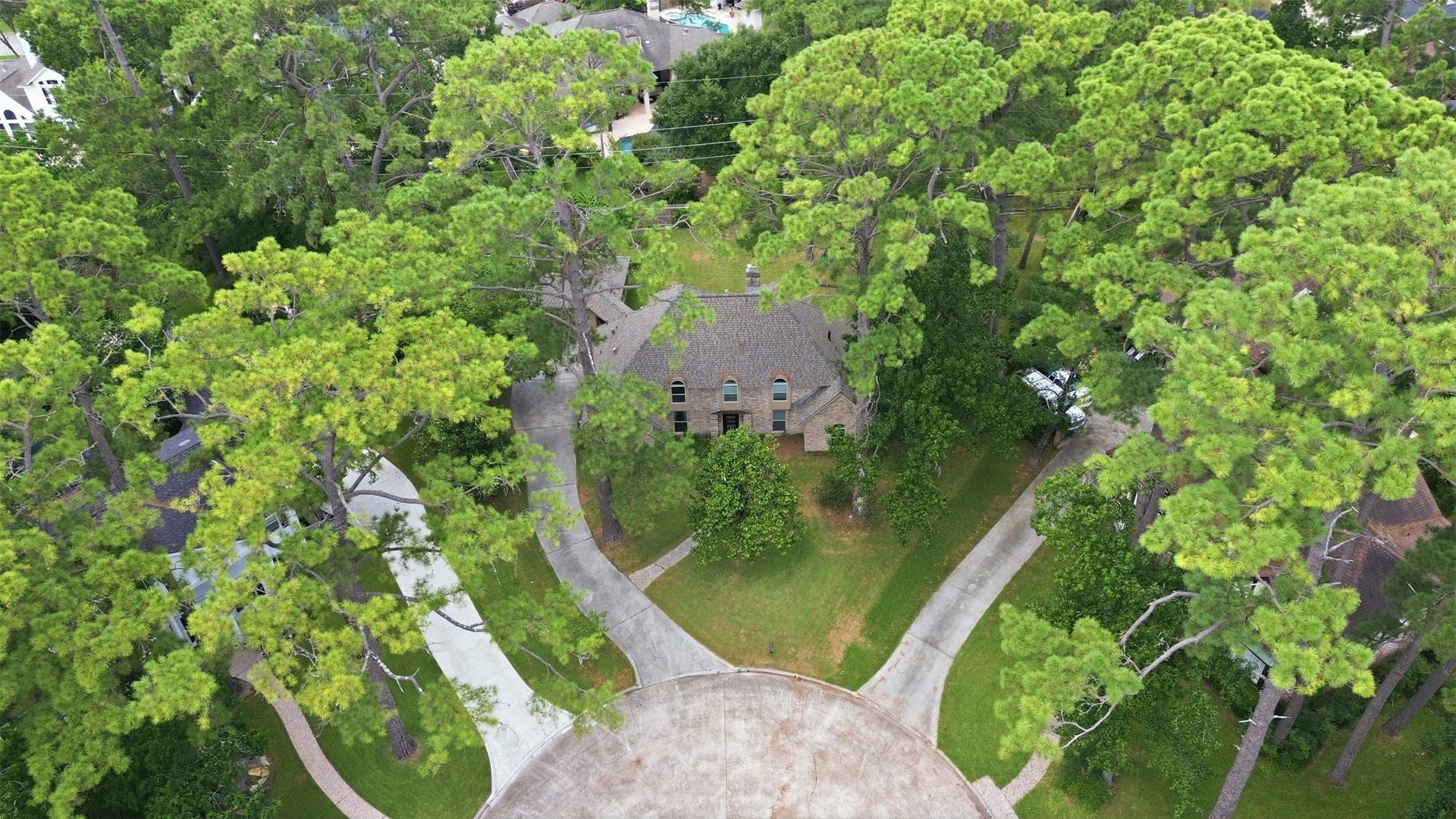 6518 Elmgrove Road, Spring, TX 77389 Tucked at the end of a quiet cul-de-sac, this expansive lot is beautifully surrounded by mature trees.