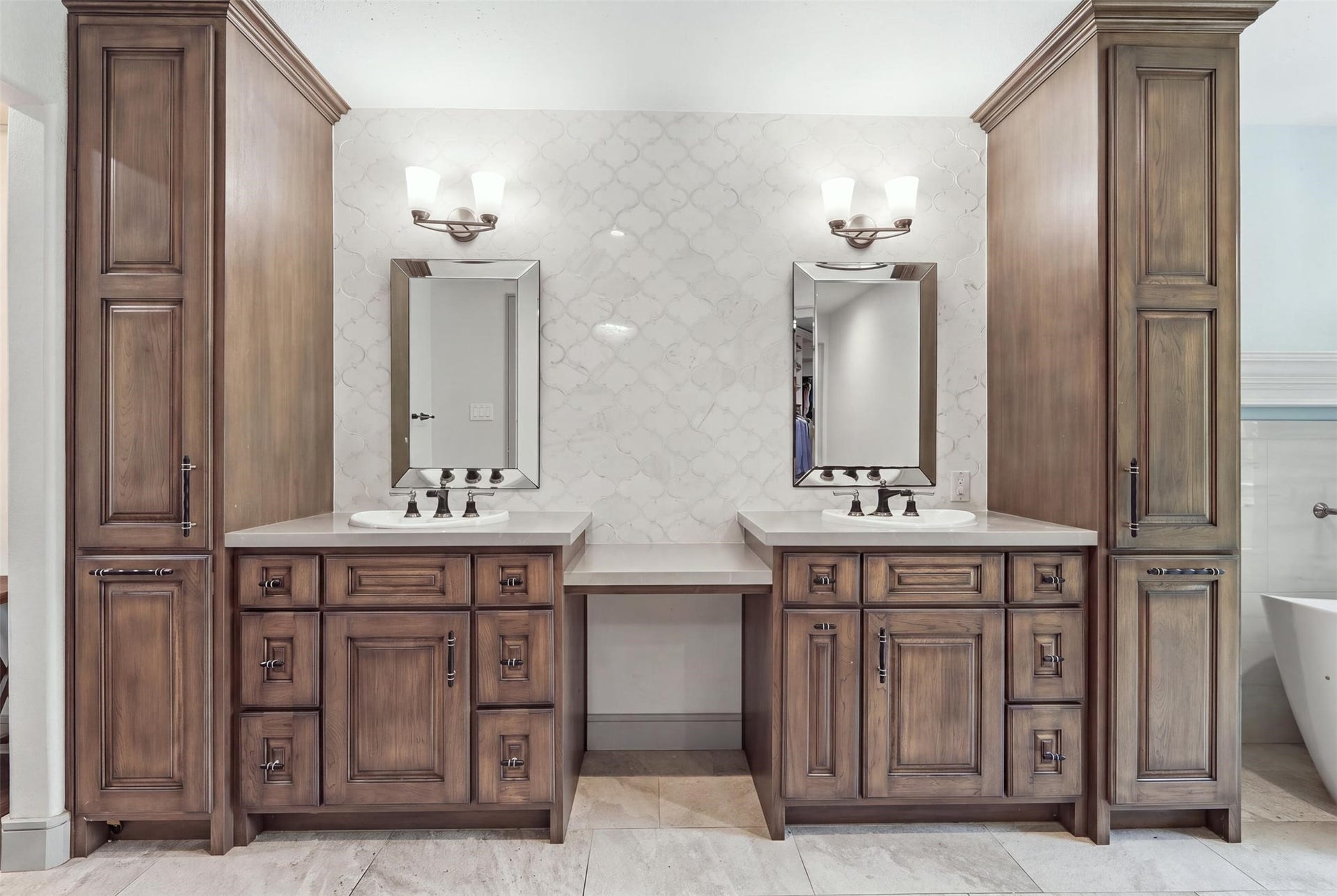 6518 Elmgrove Road, Spring, TX 77389 Beautifully appointed primary bath with dual vanities, custom cabinetry, abundant storage, and a dedicated vanity area.